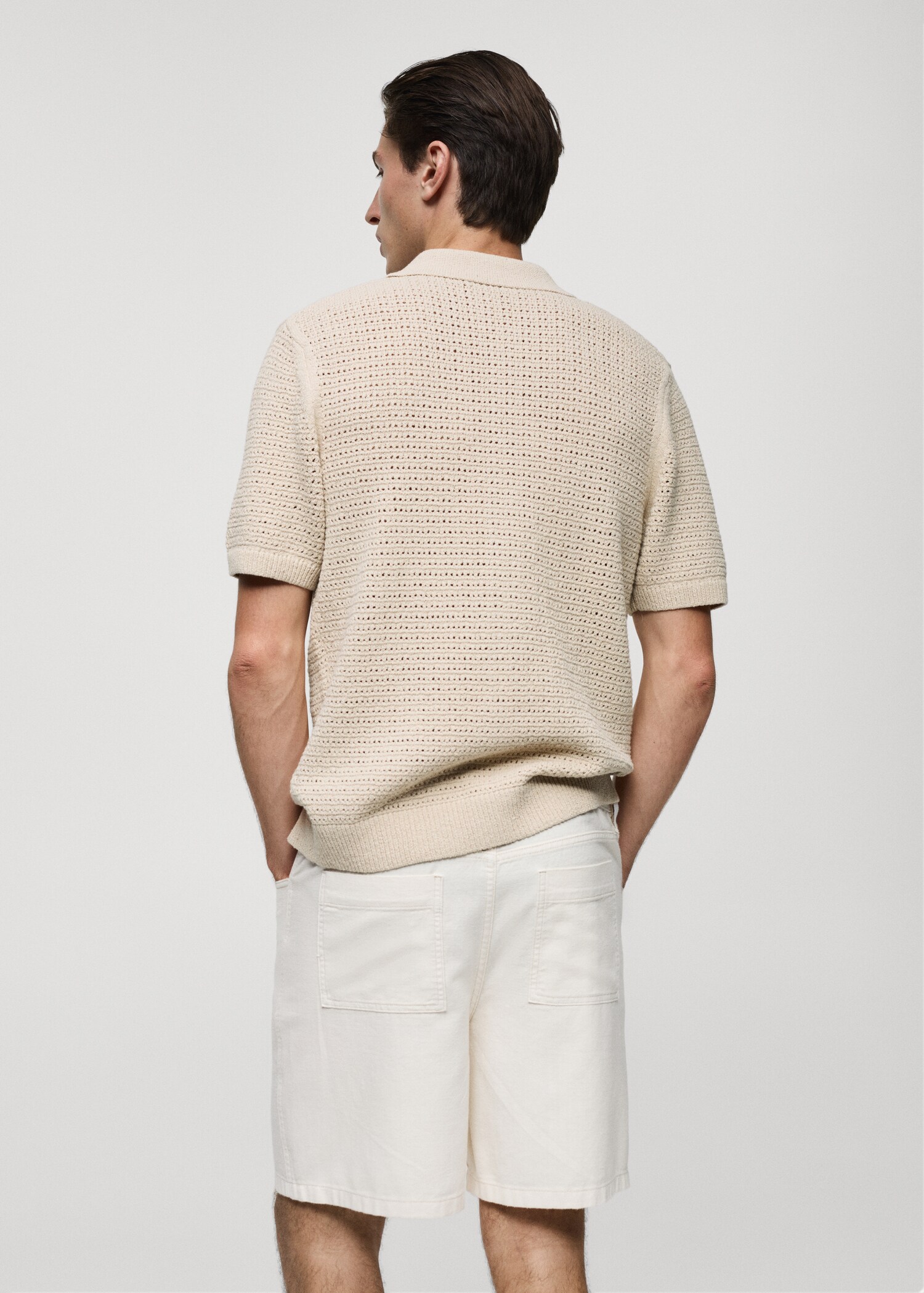 Openwork knit polo with buttons - Reverse of the article