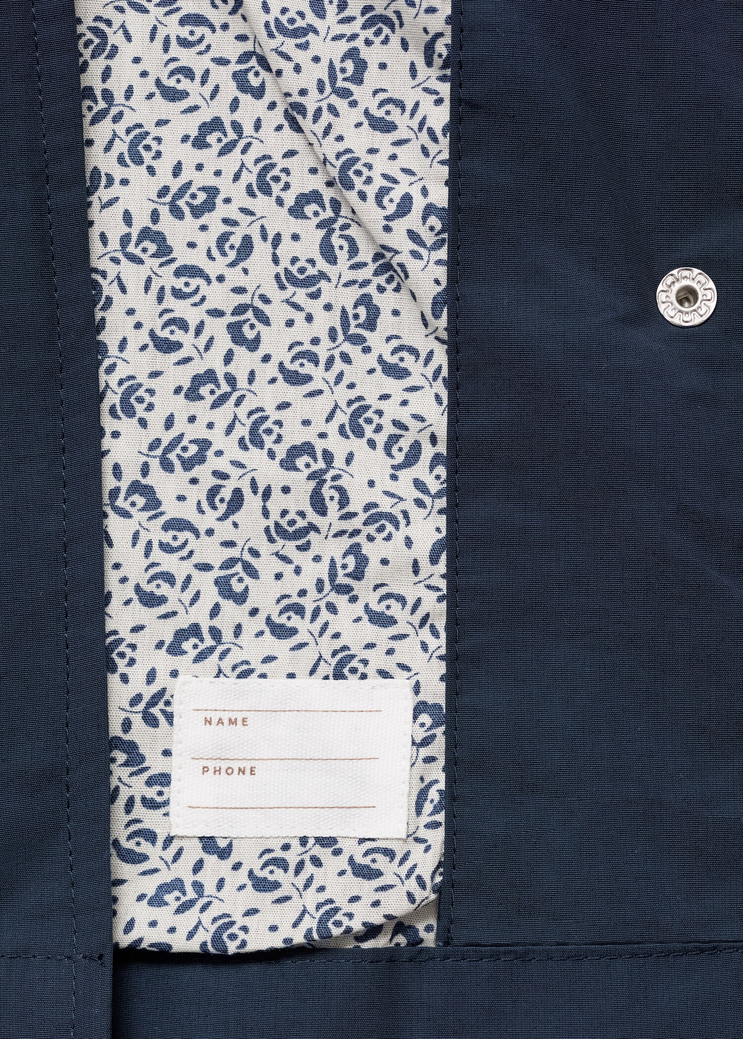 Veste imperméable à capuche - Détail de l'article 0