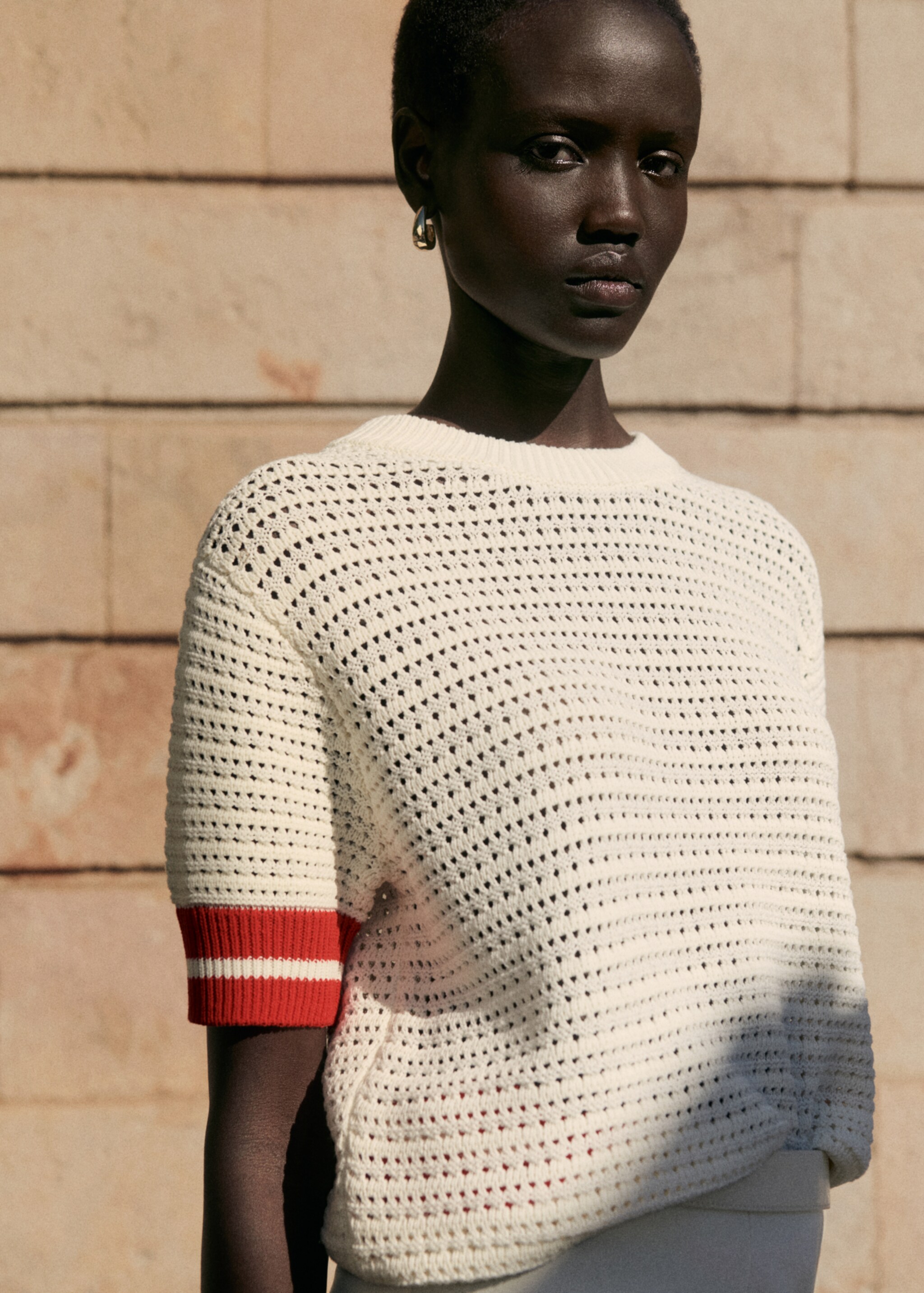 Striped open-work sweater - Details of the article 6, Red. Ref: 77082923-00.