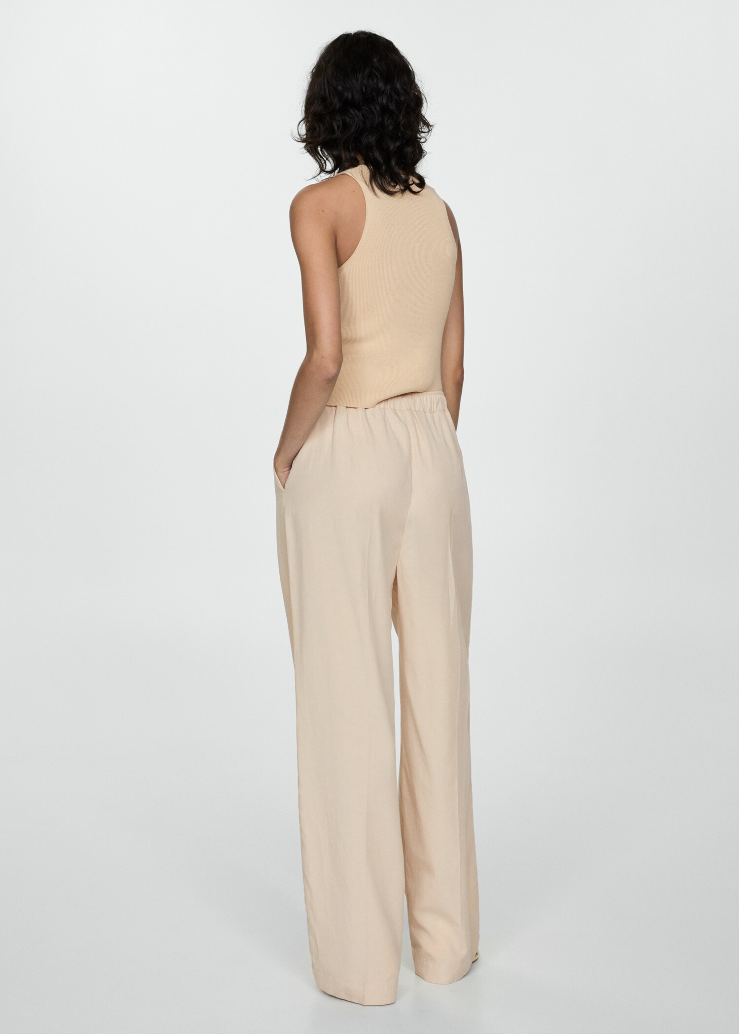 Lyocell pleated pants - Reverse of the article