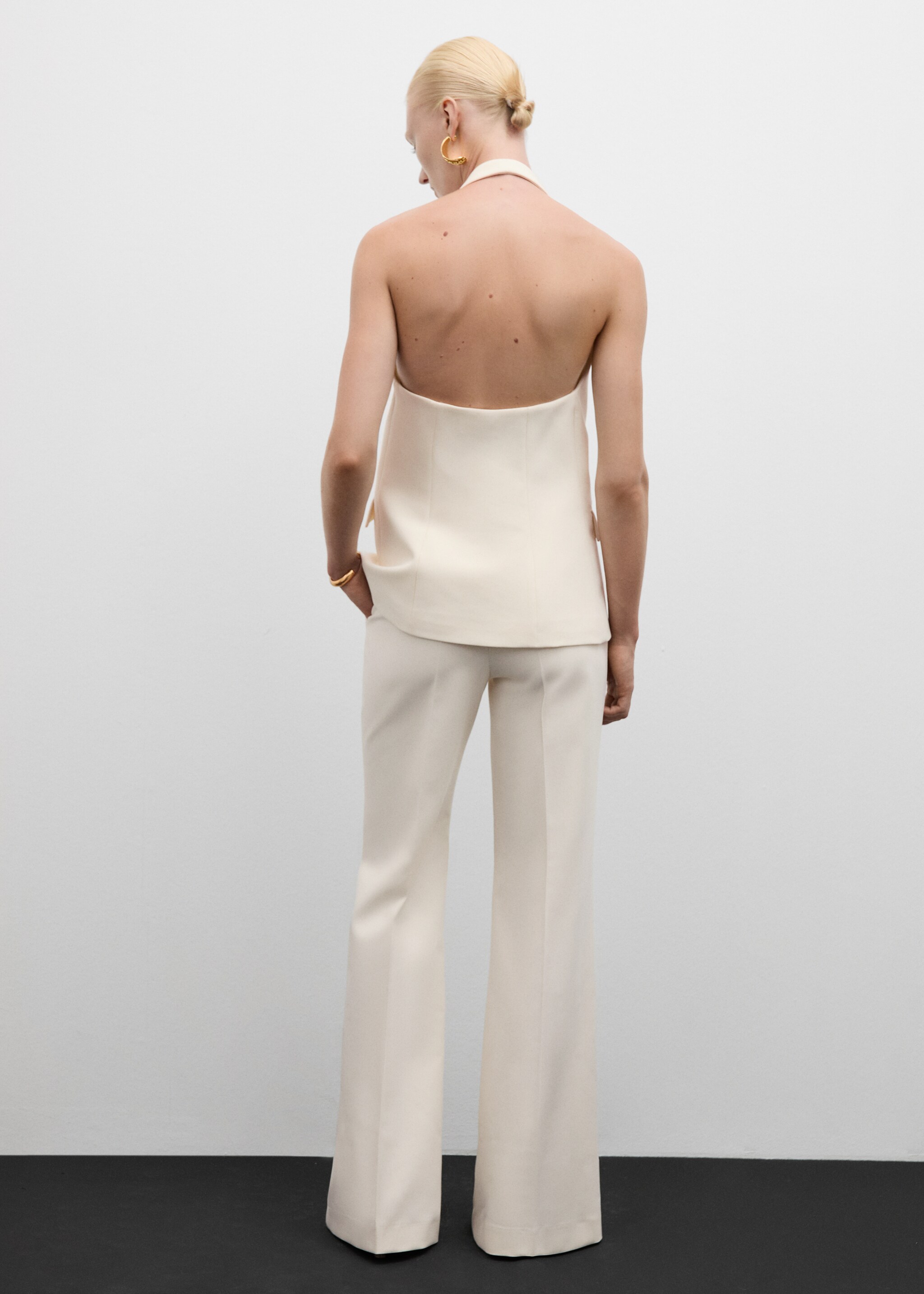 Flared trouser suit - Reverse of the article