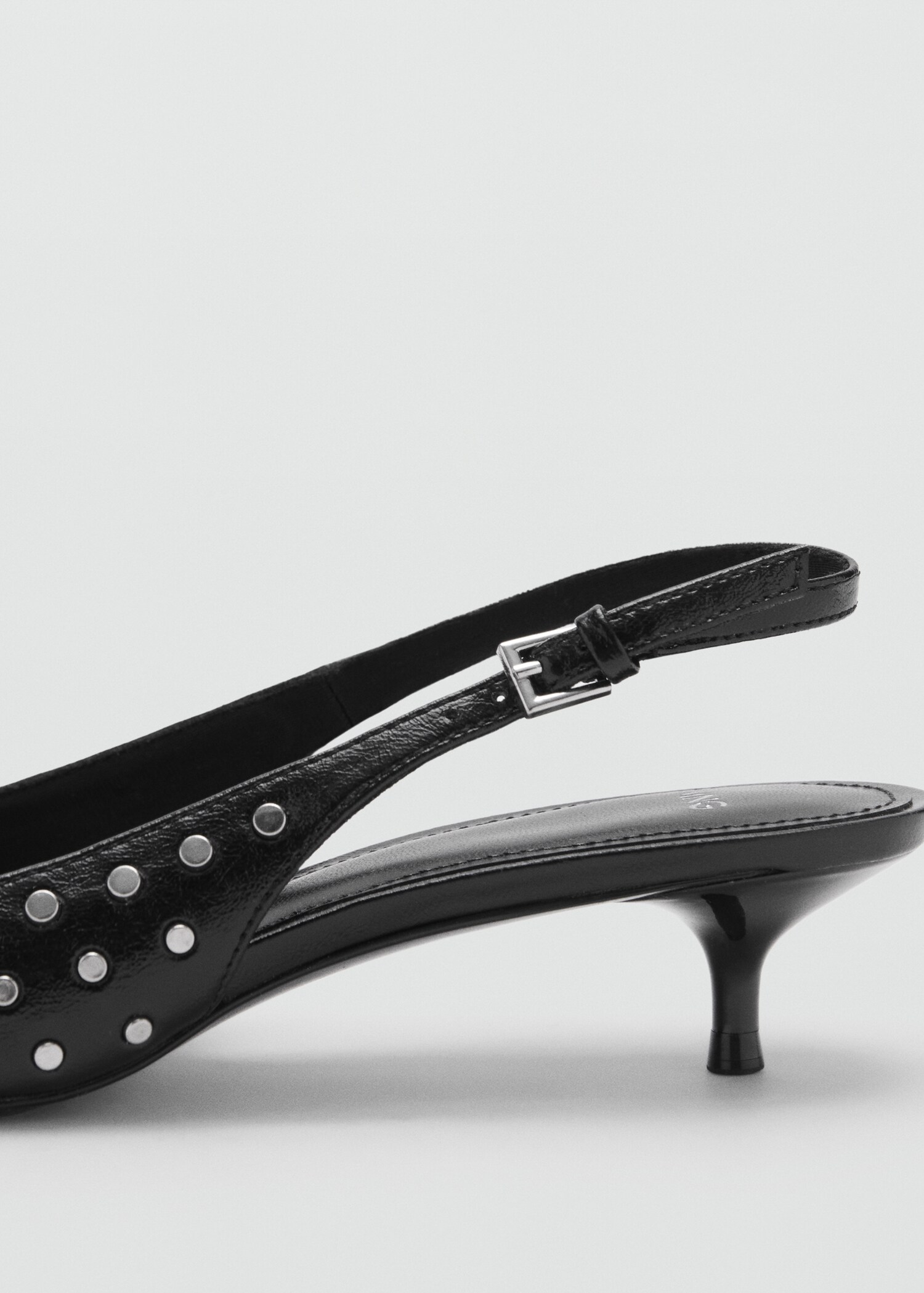 Chaussures cloutées ouvertes à l’arrière - Détail de l'article 1