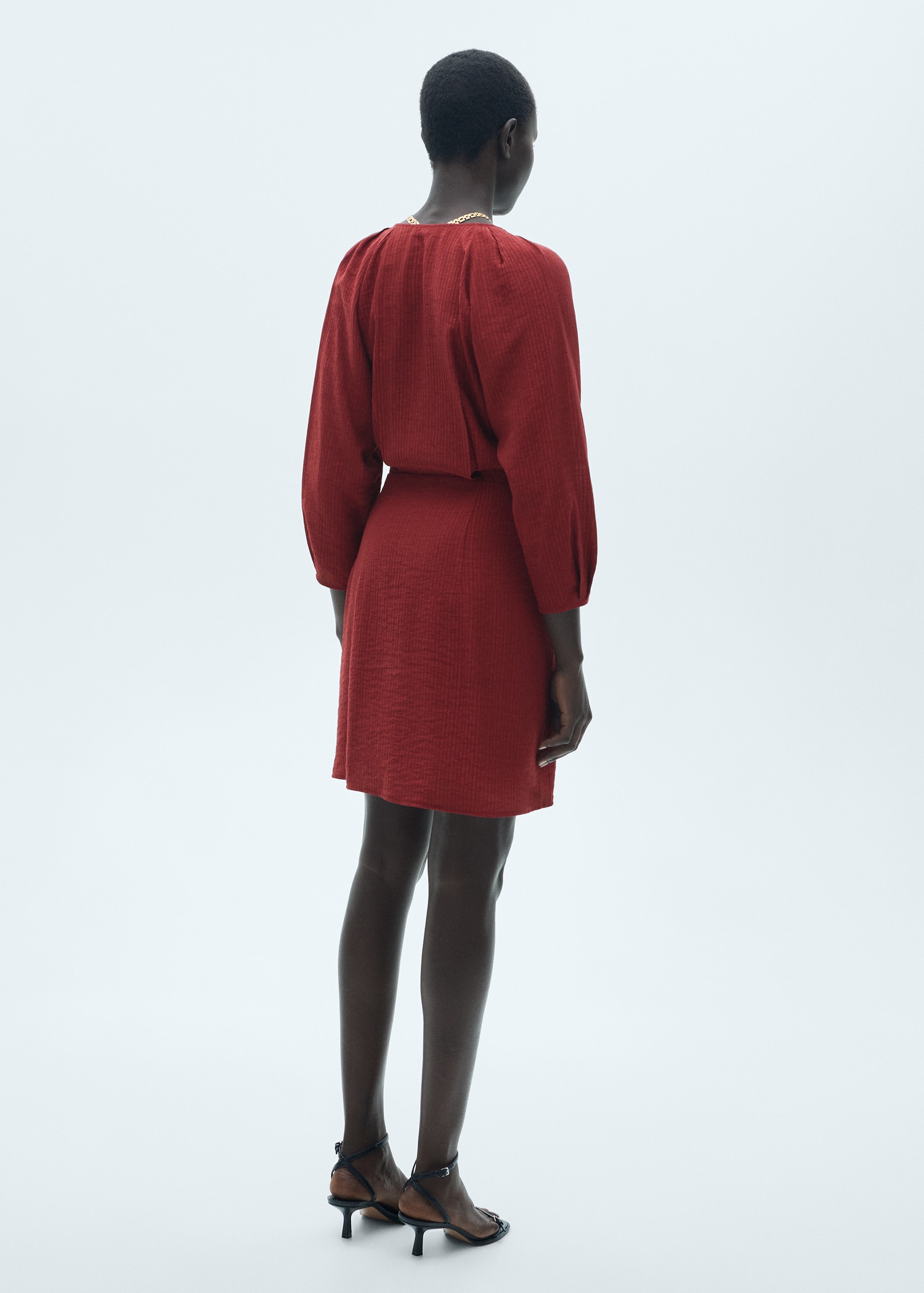 Textured short dress - Reverse of the article