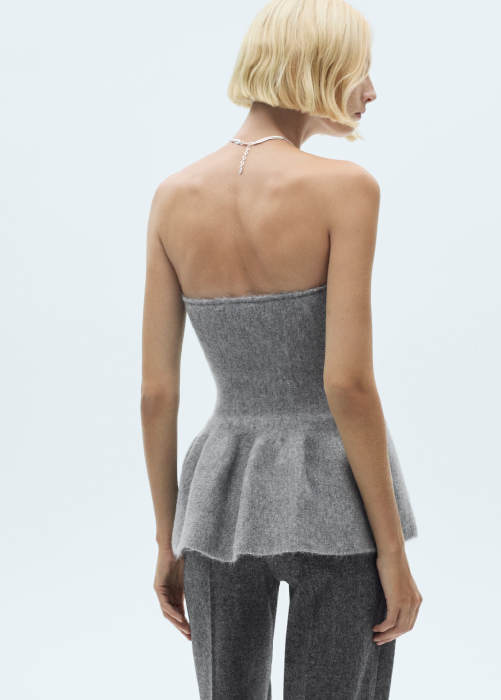 Strapless peplum top