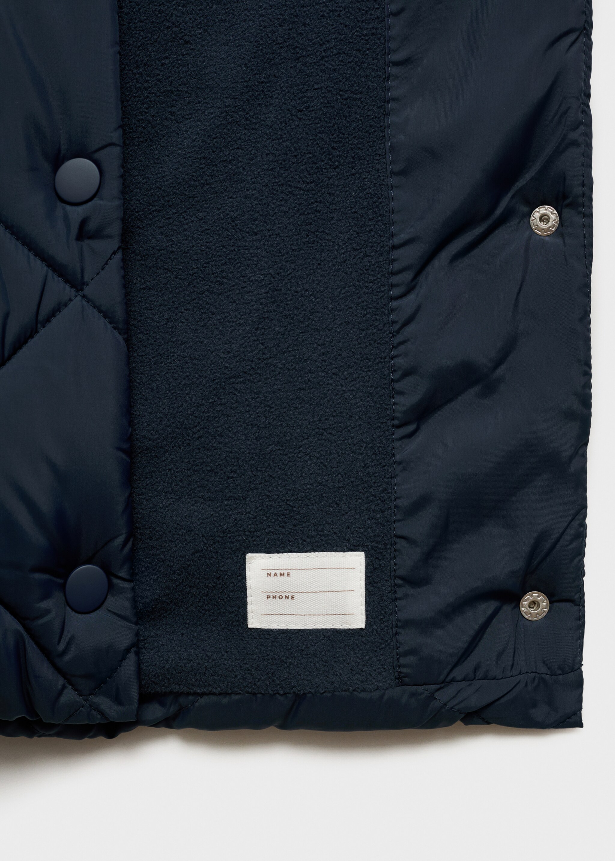 Gilet matelassé long - Détail de l'article 0, Bleu marine foncé. Ref: 77093266-00.