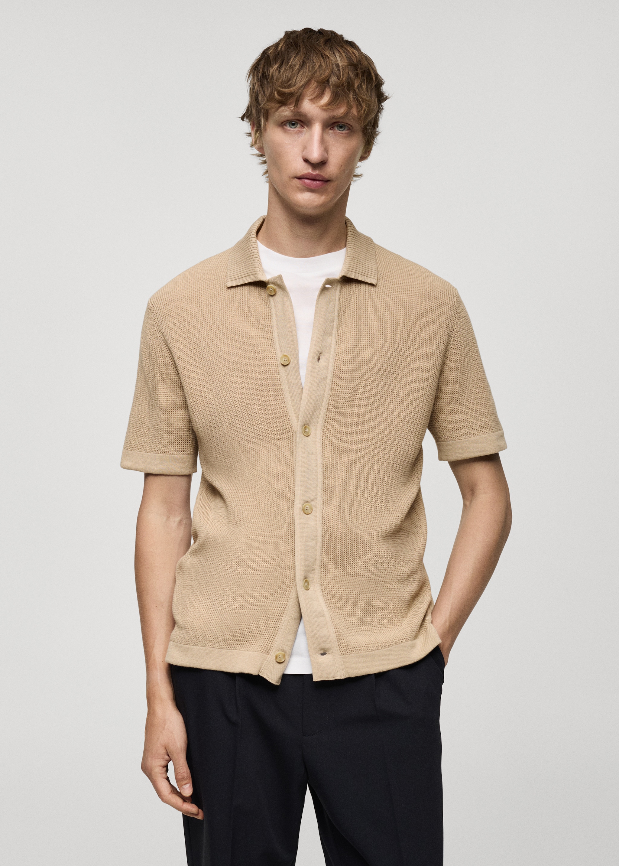 Buttoned micro-structure knitted polo shirt Men MANGO Georgia