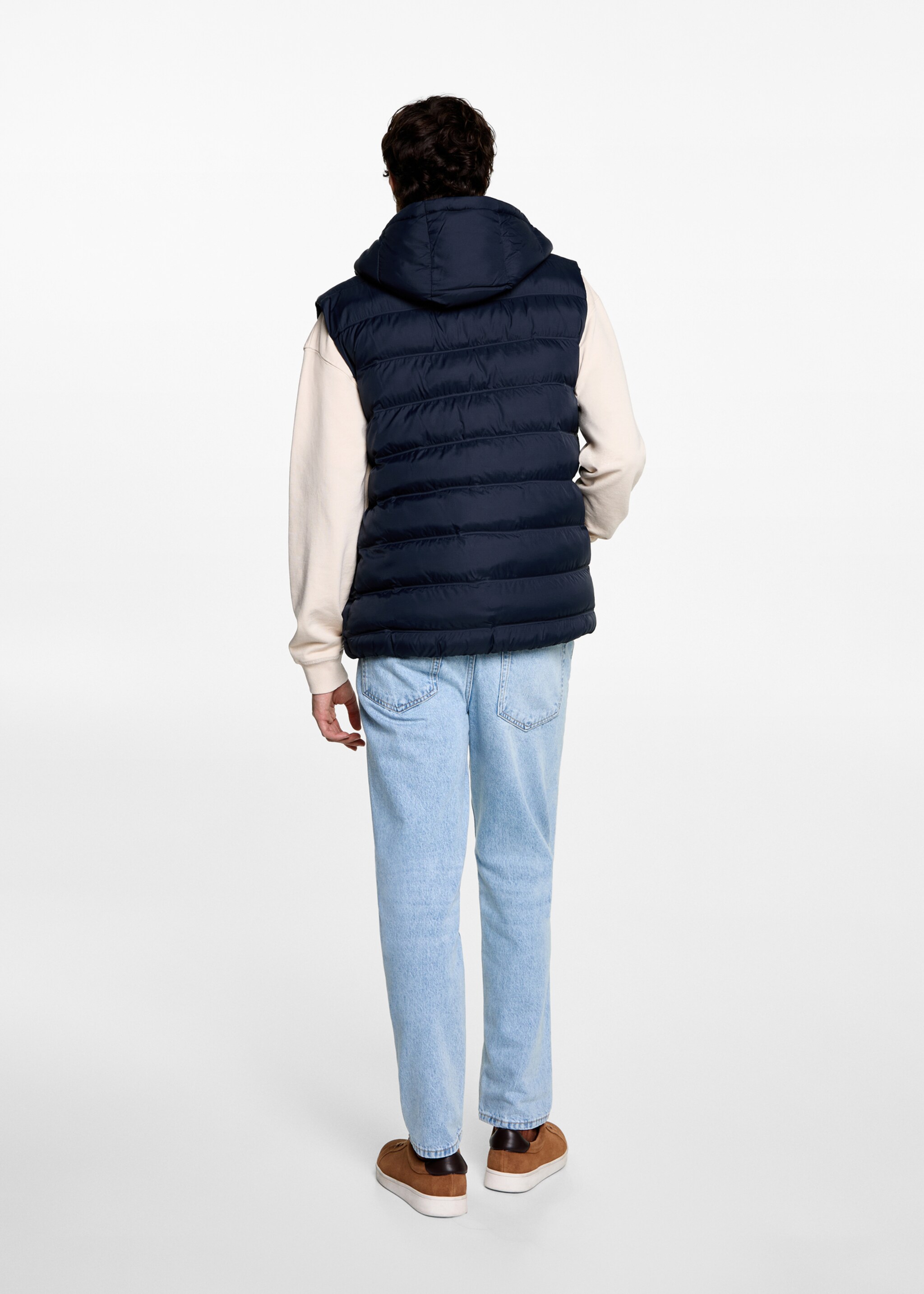 Quilted gilet with hood - Reverse of the article