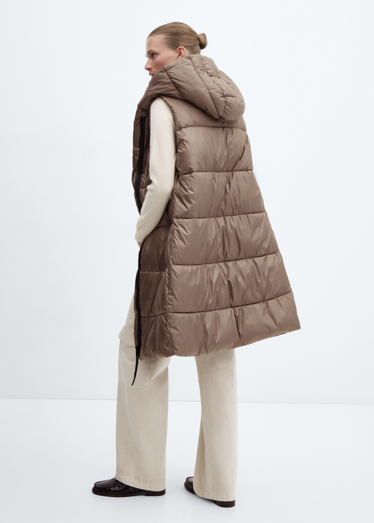 Long quilted gilet - Reverse of the article