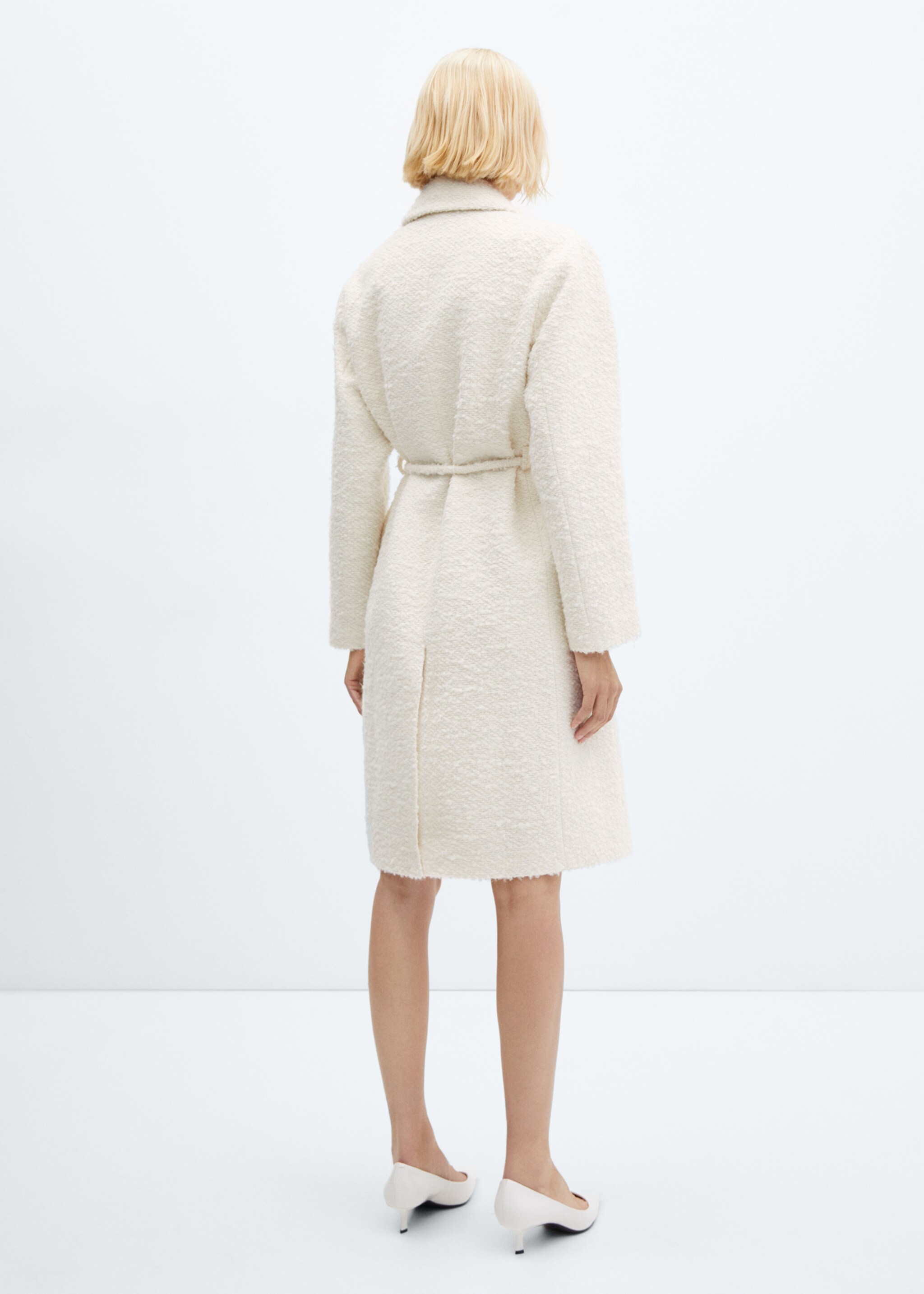 Manteau revers ceinture - Verso de l’article