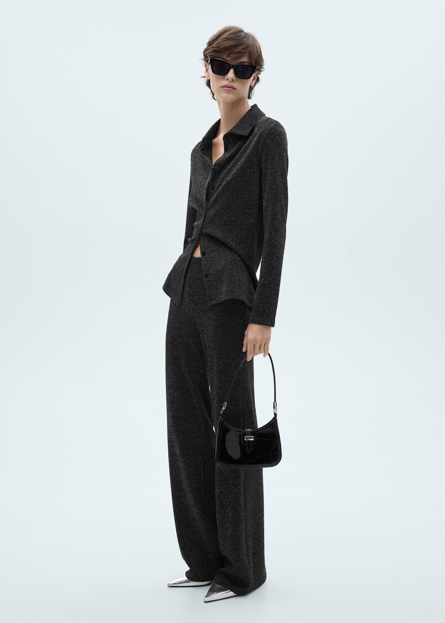 Pantaloni evazați din tricot lurex - Plan general