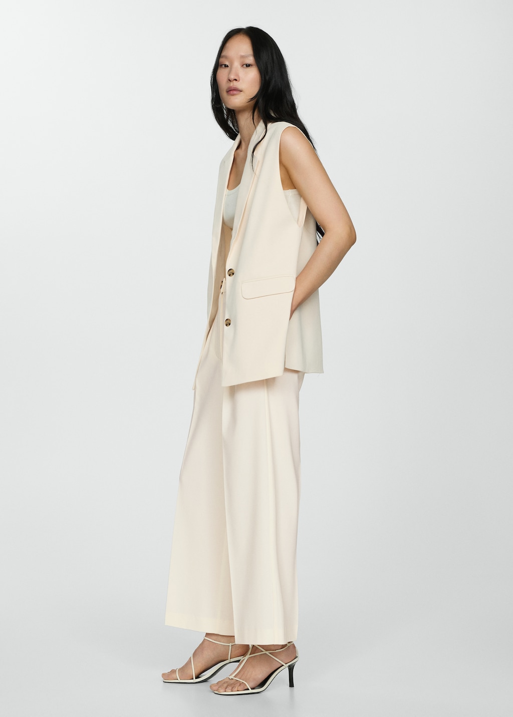 Long gilet with openings