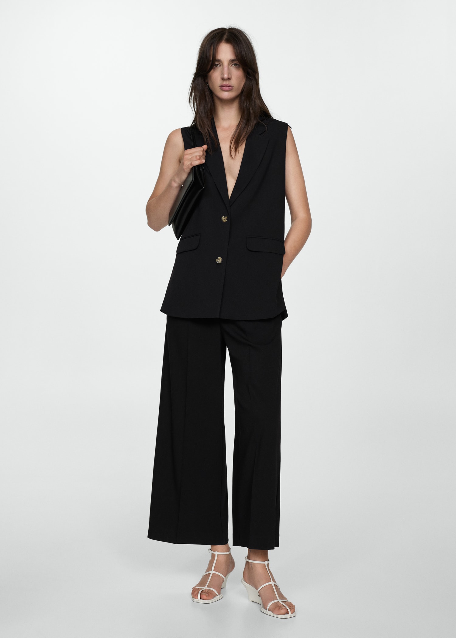 Chaleco aberturas largo