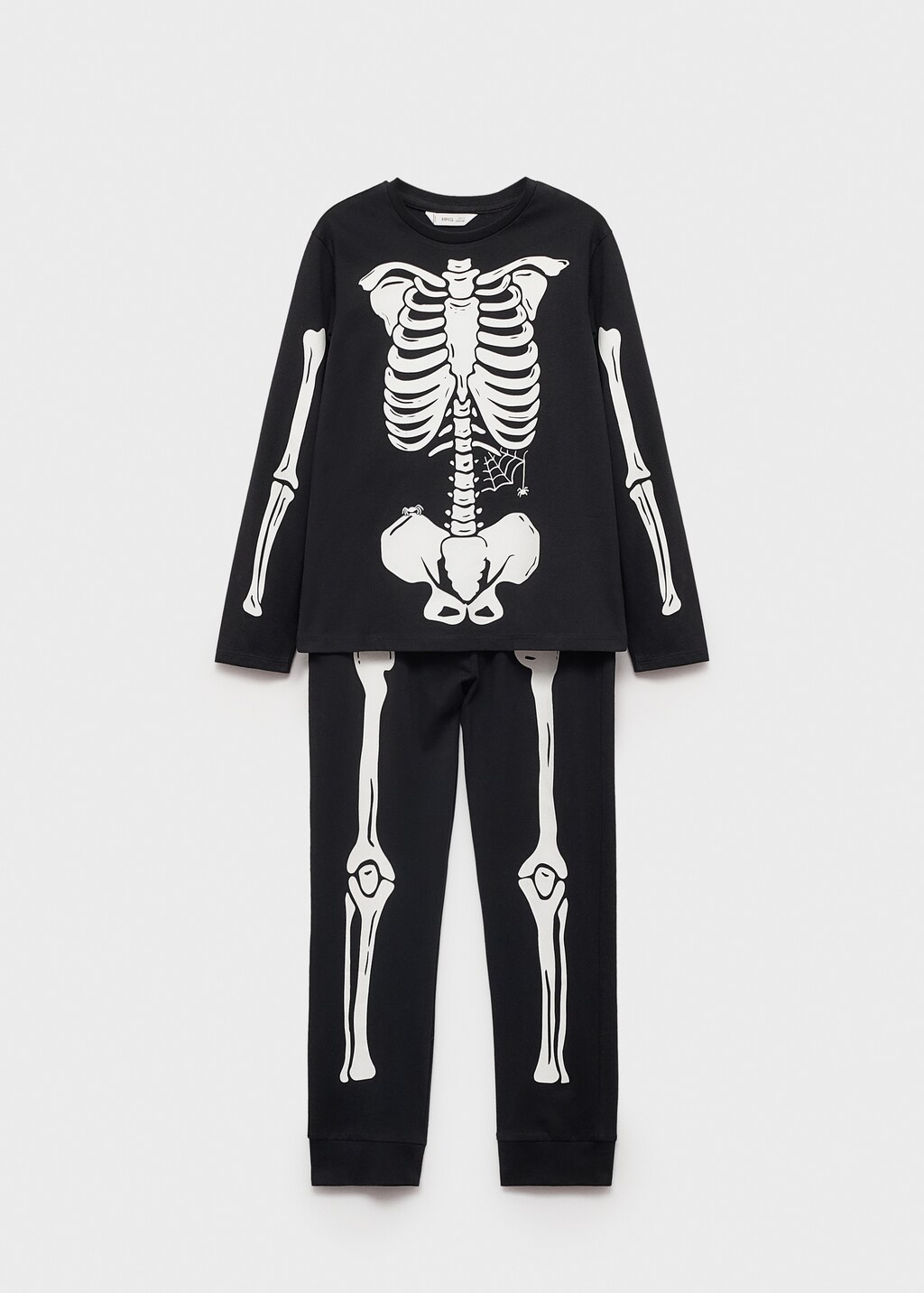 Pijama esqueleto brilla en la oscuridad sale