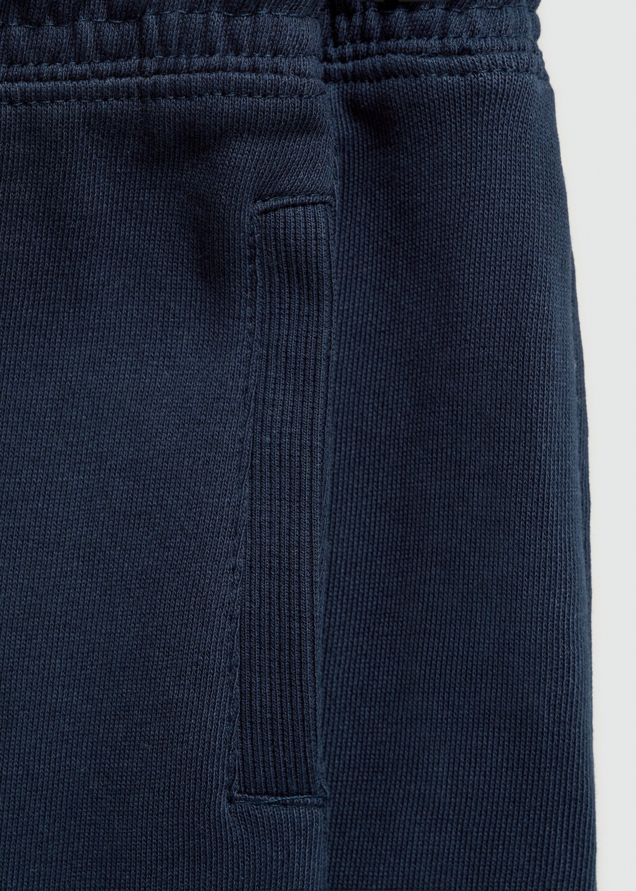 Cotton jogger-style trousers - Details of the article 0