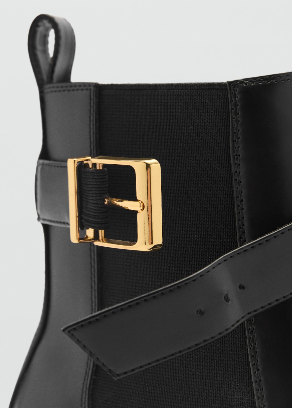Ankle boots with elastic panel and buckle