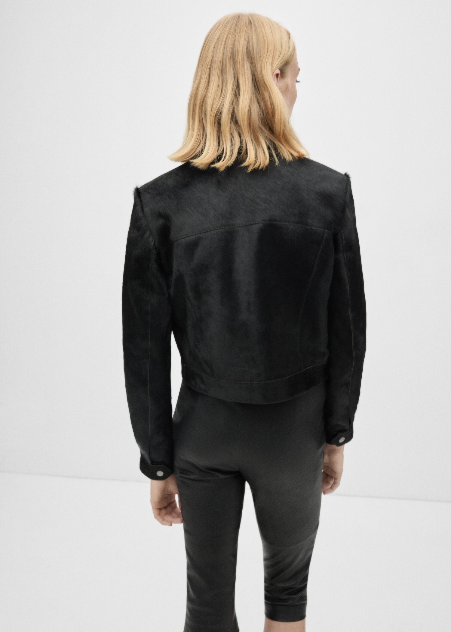 Veste cuir imitation fourrure - Verso de l’article