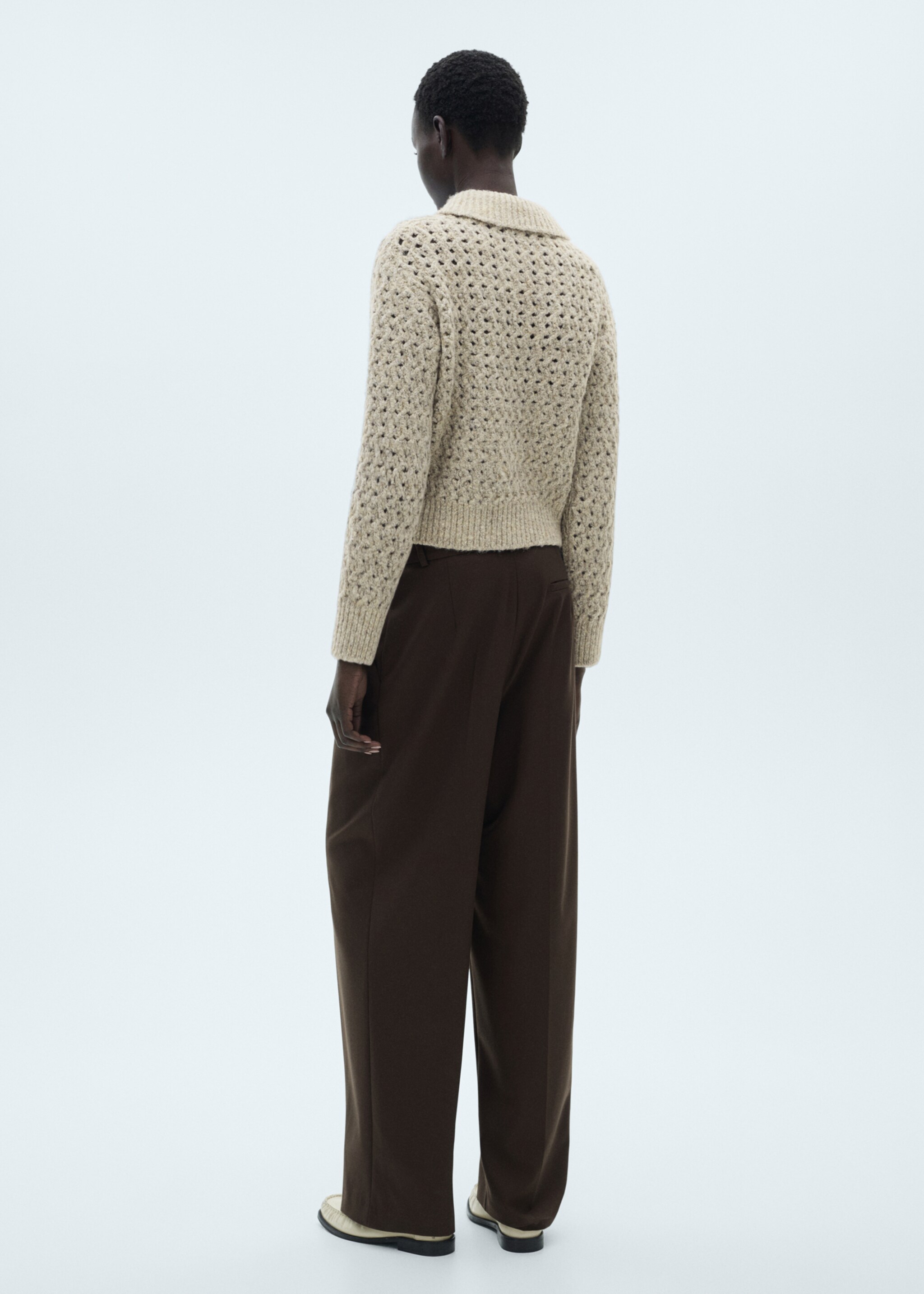 Openwork knitted polo-neck sweater - Reverse of the article