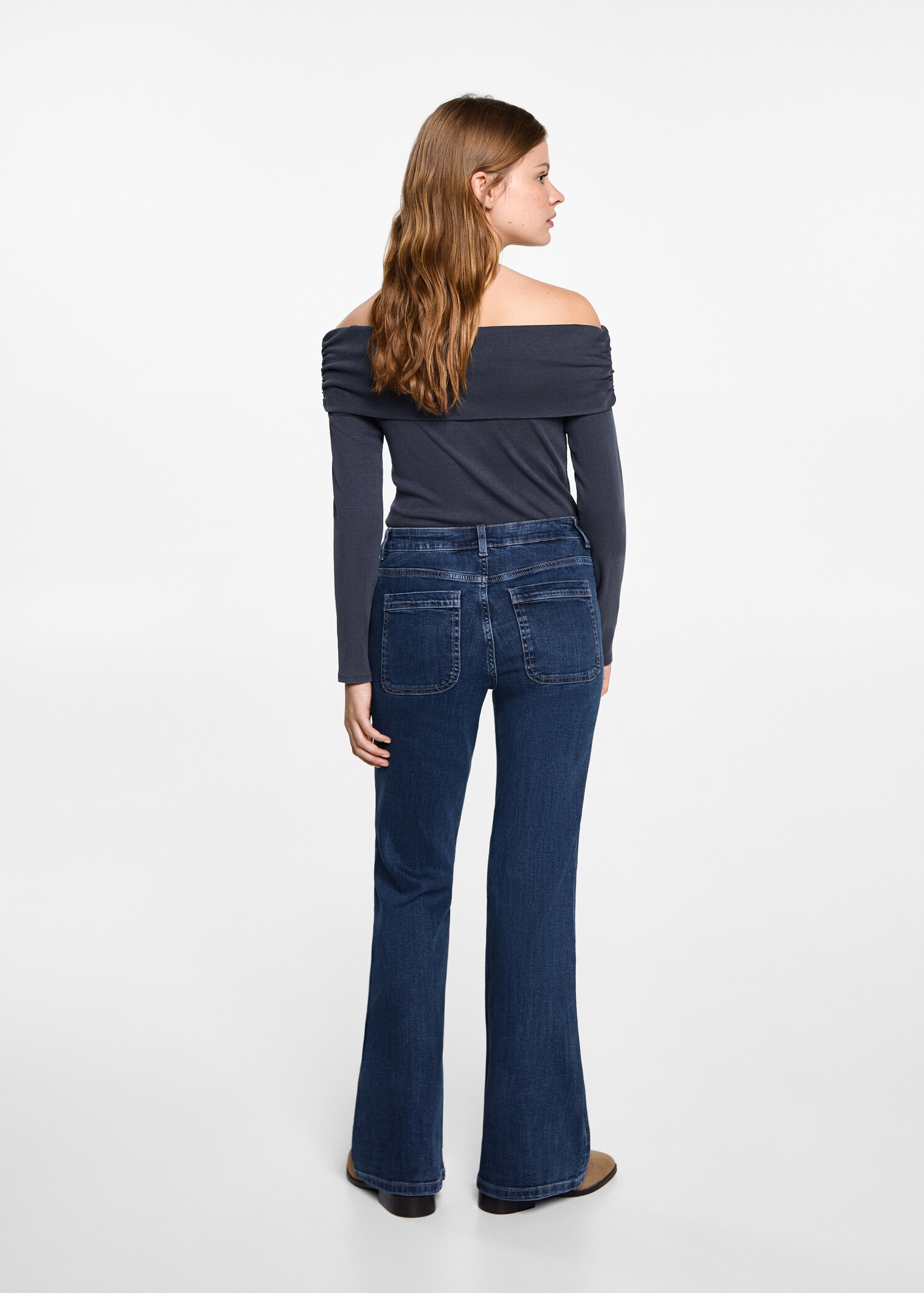 Flared jeans with pocket - Reverse of the article