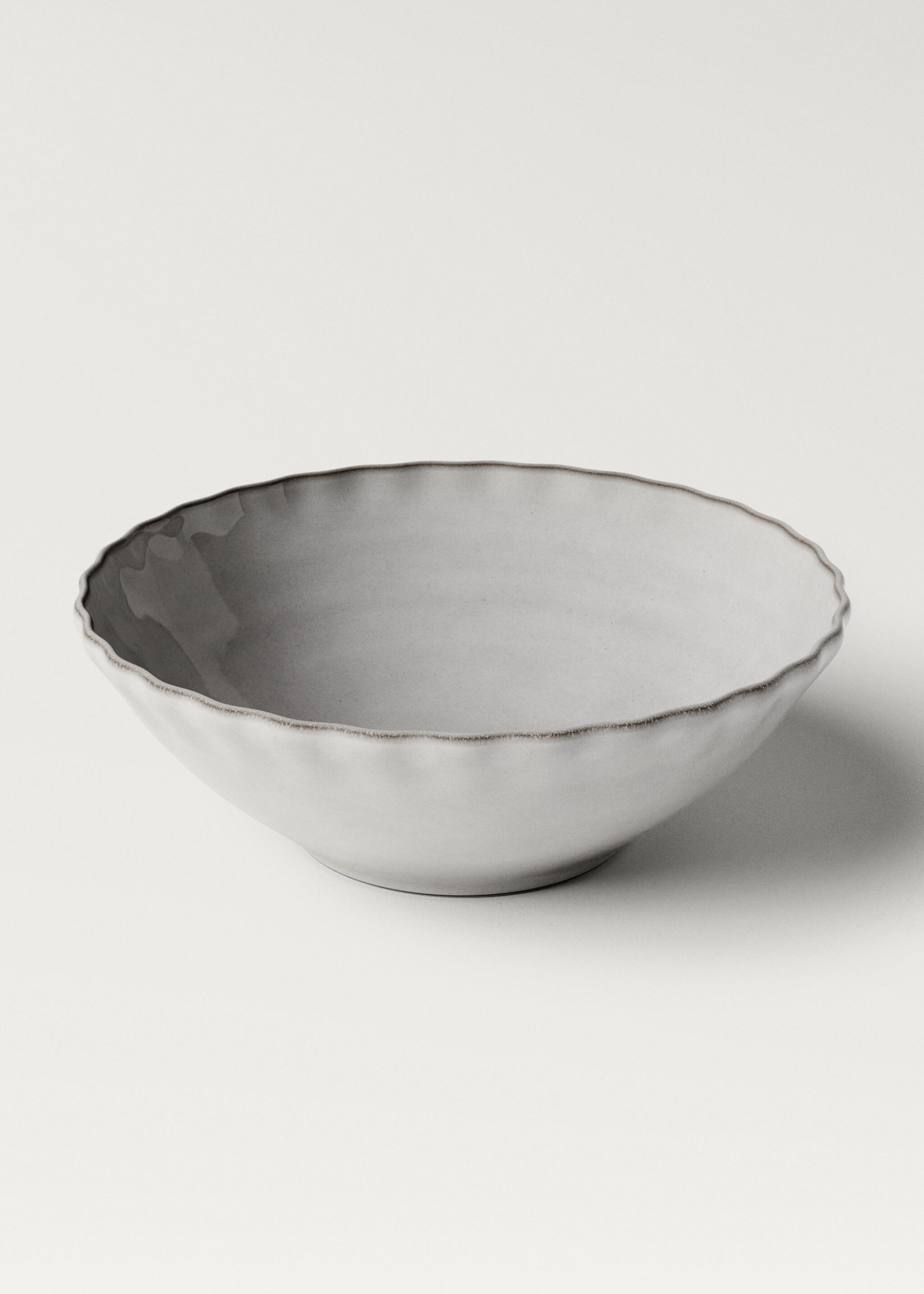 Stoneware bowl with waves and contrasting rim - Details of the article 1