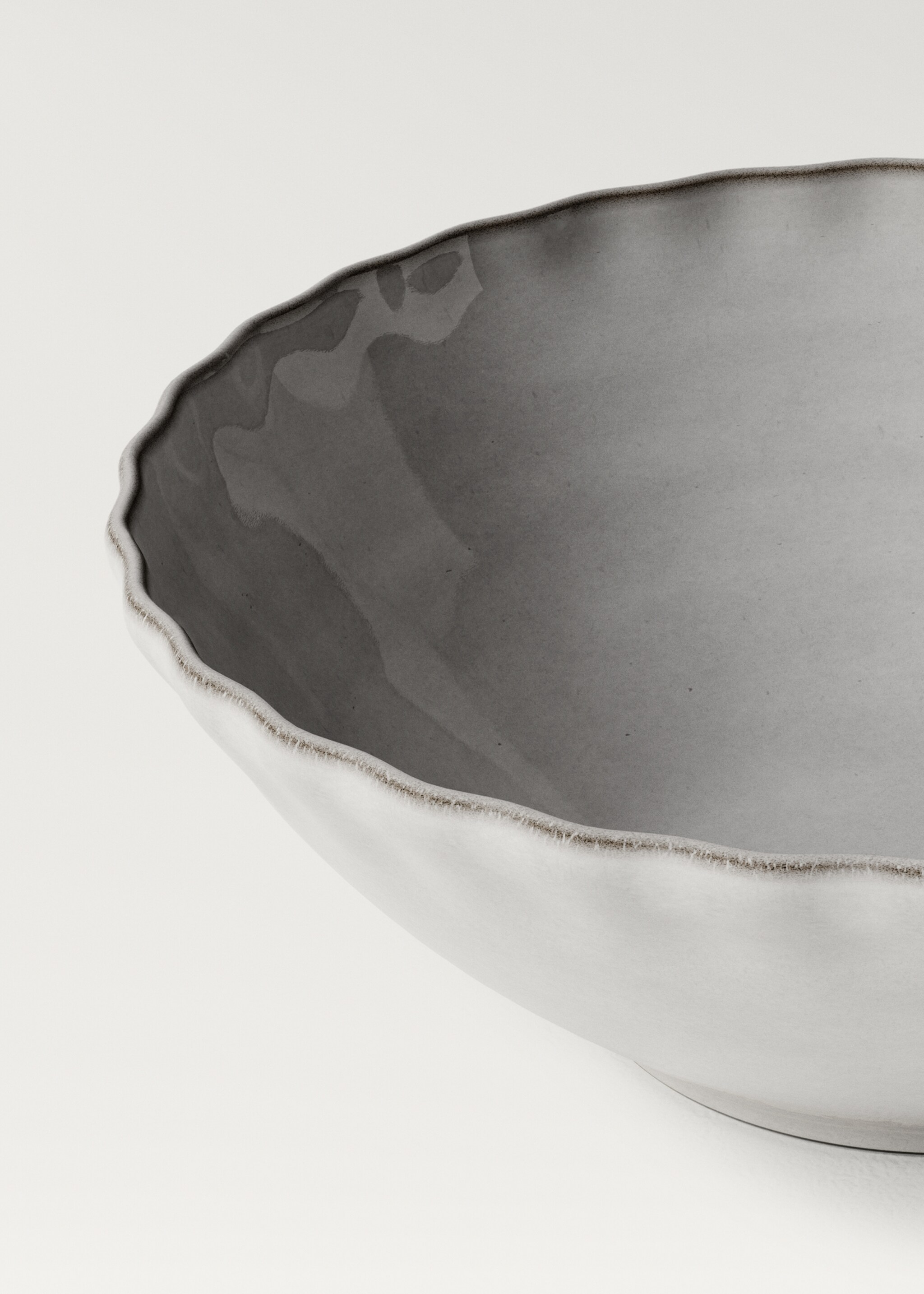 Stoneware bowl with waves and contrasting rim - Details of the article 2