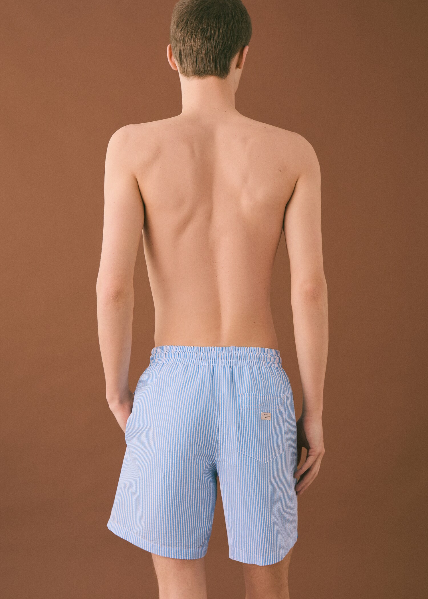 Striped drawstring swimsuit - Reverse of the article