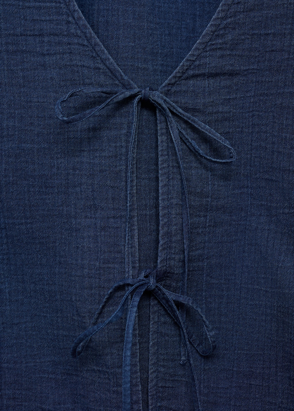 Flowy denim top with bows