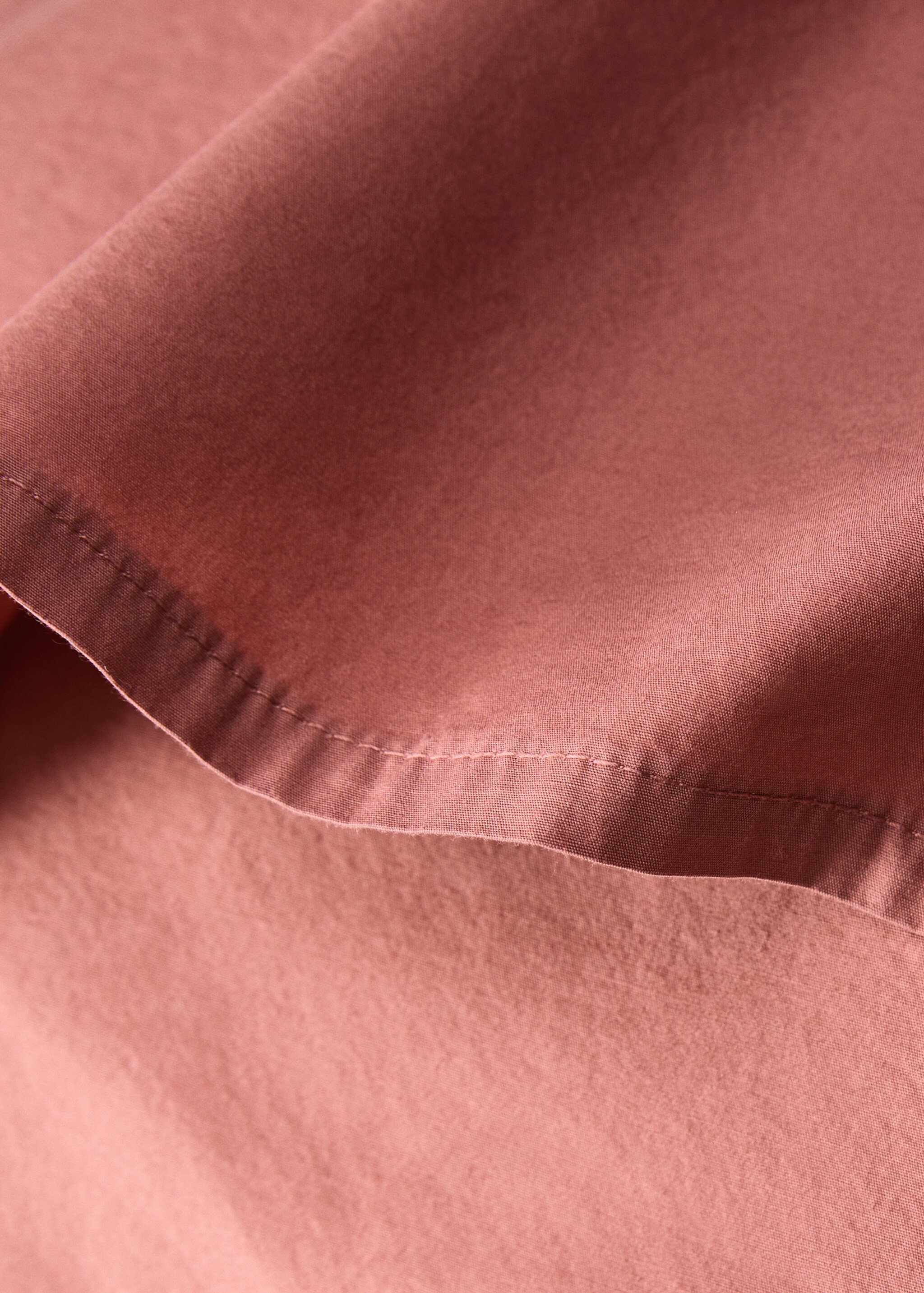 Zwei Kopfkissenbezüge aus Baumwollpopeline mit doppelter Steppnaht, 50 x 75 cm - Detail des Artikels 1, Geranienrosa. Ref: 87013030-00.