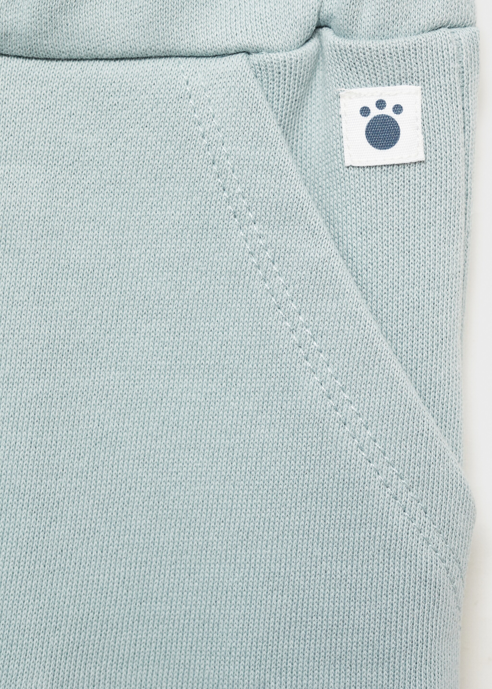 Knit jogger-style trousers - Details of the article 8