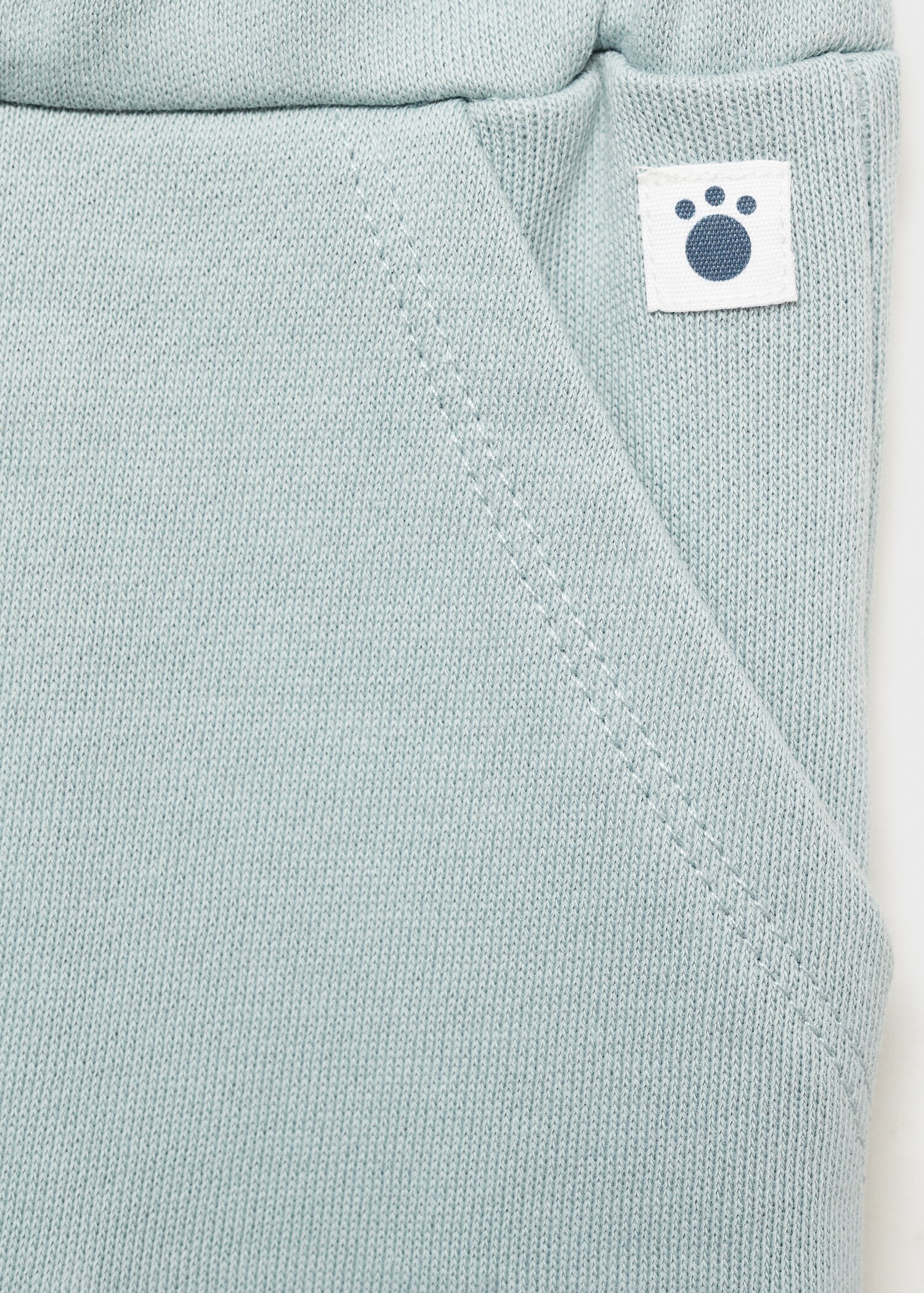 Knit jogger-style trousers - Details of the article 8