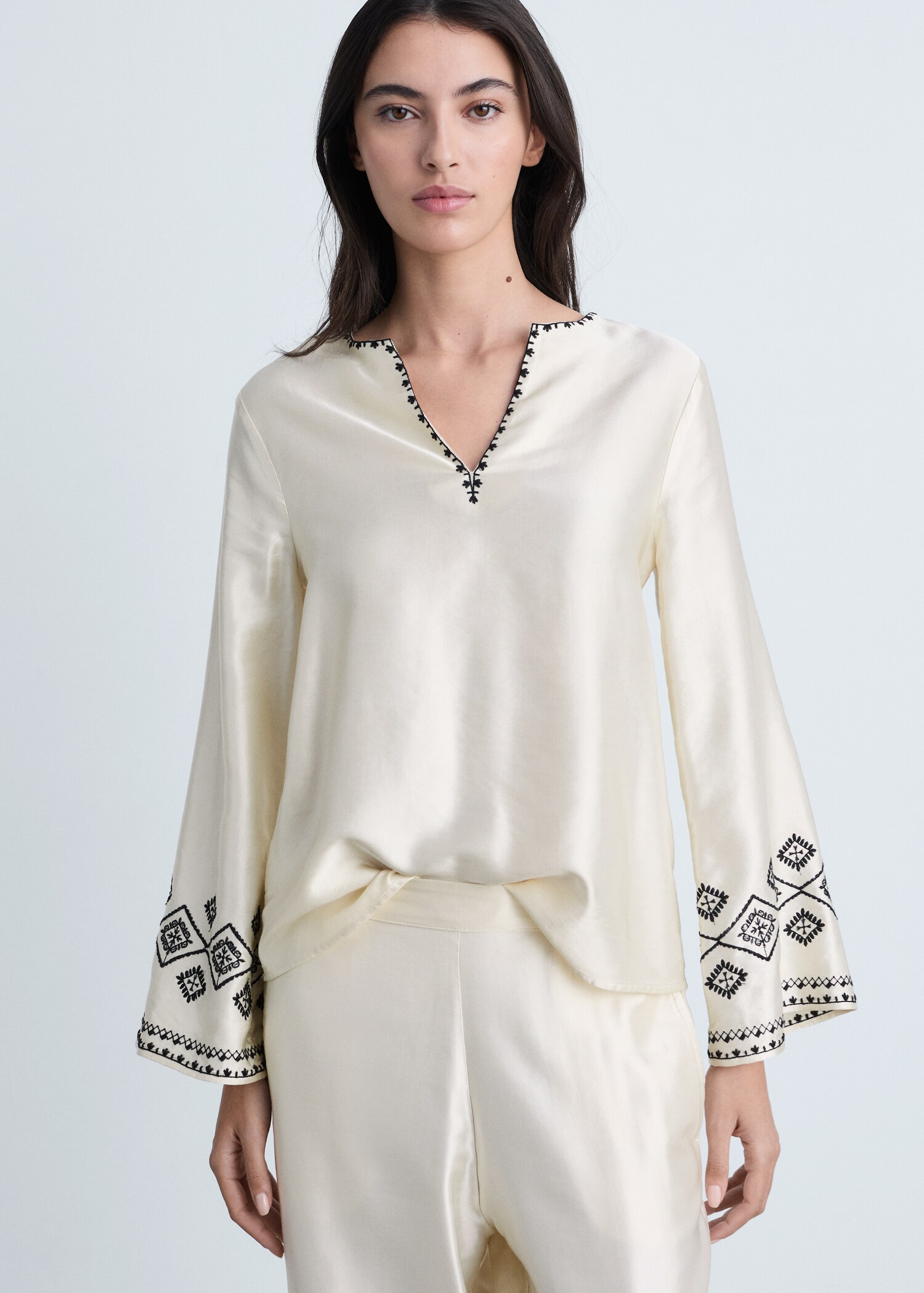 Wide-leg trousers with embroidered hem - Details of the article 1