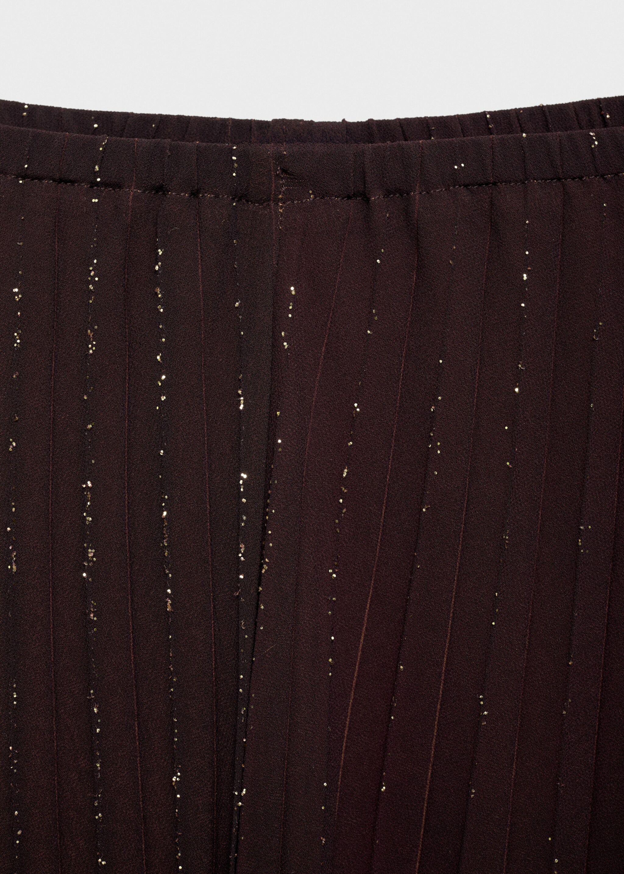 Pleated trousers with a shiny finish - Details of the article 8