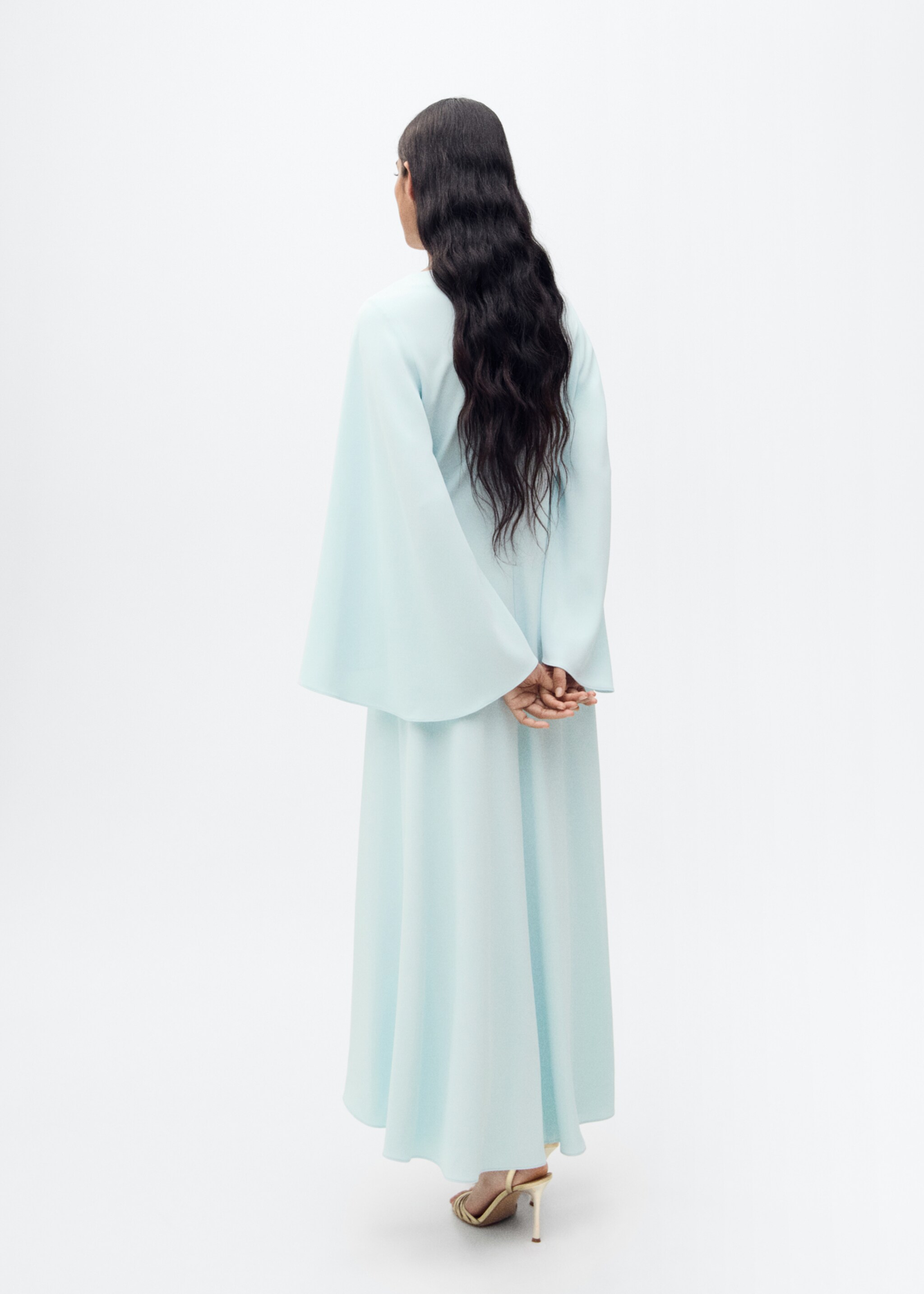 Long flared sleeve dress - Reverse of the article
