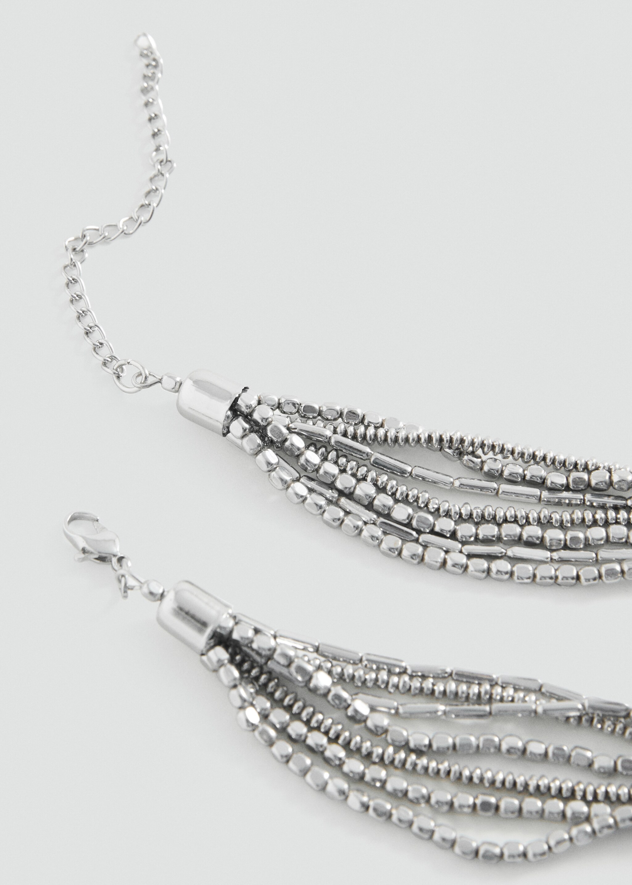 Hängande flera halsband - Detaljer om artikeln 1