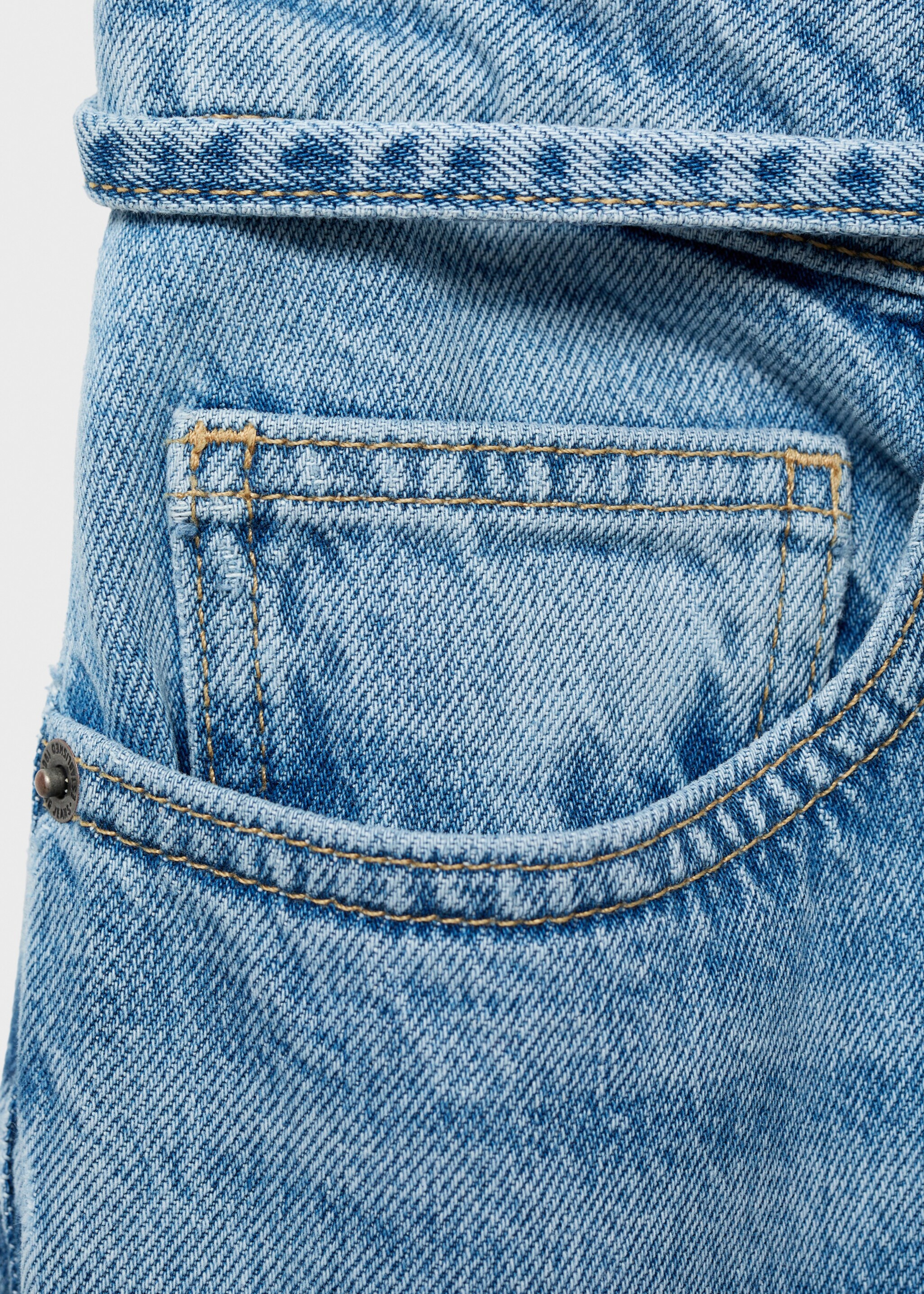 Ballonjeans met ceintuur - Detail van het artikel 8
