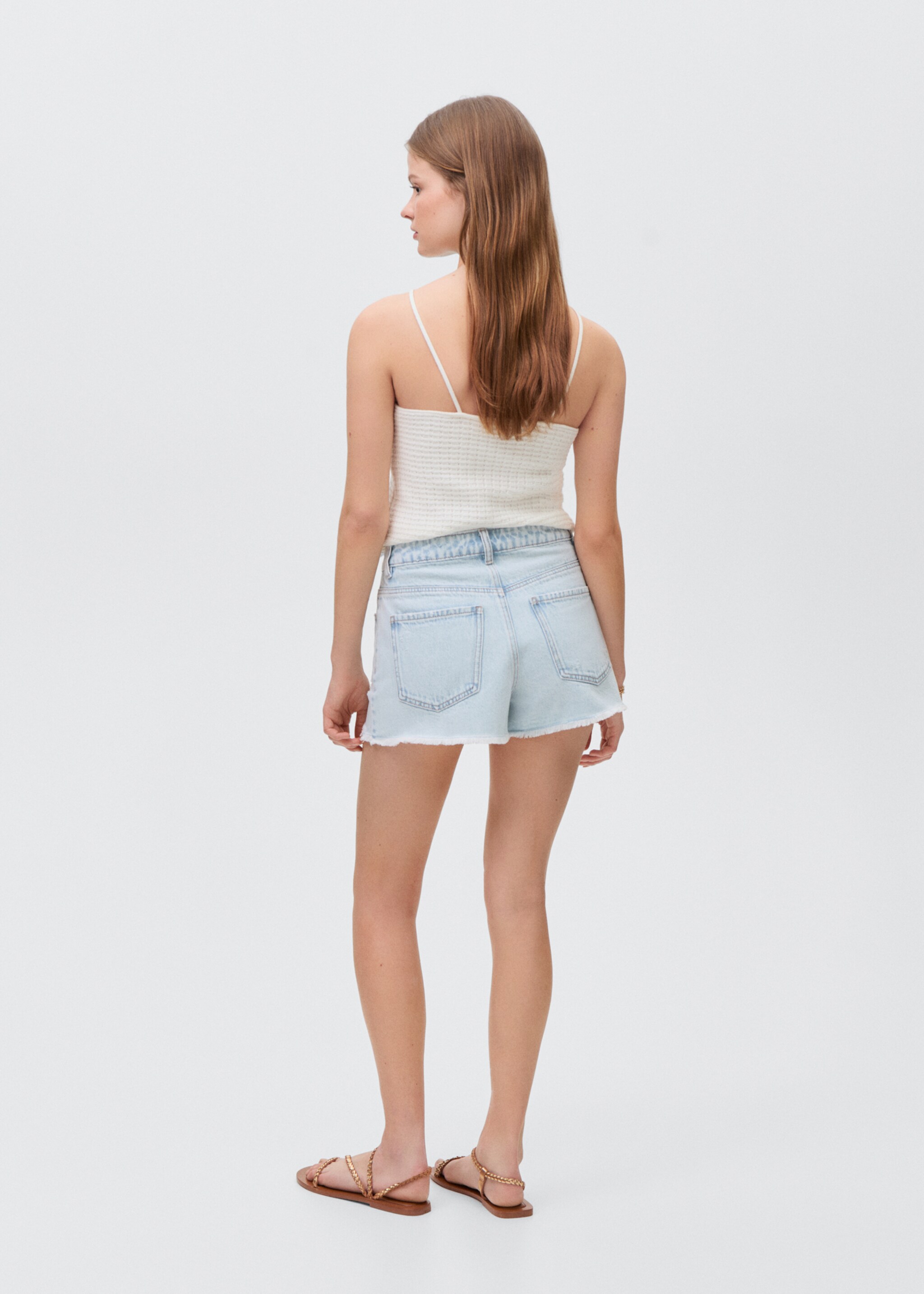 Broken denim shorts - Reverse of the article