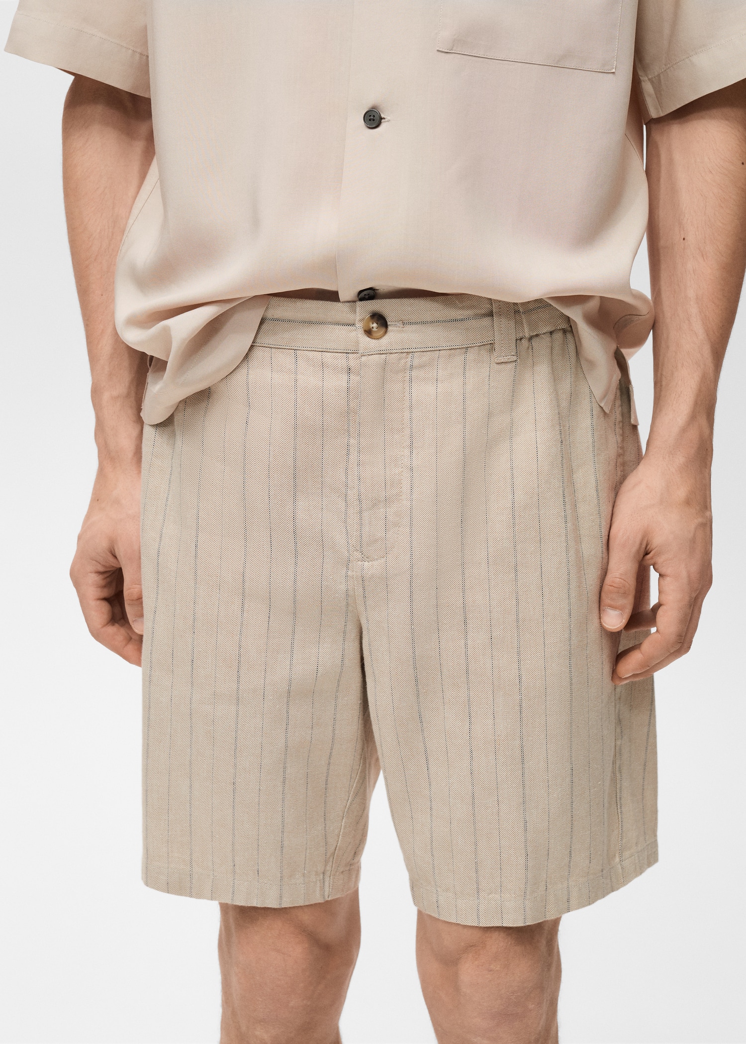 Striped linen-blend Bermuda shorts Men MANGO Lebanon