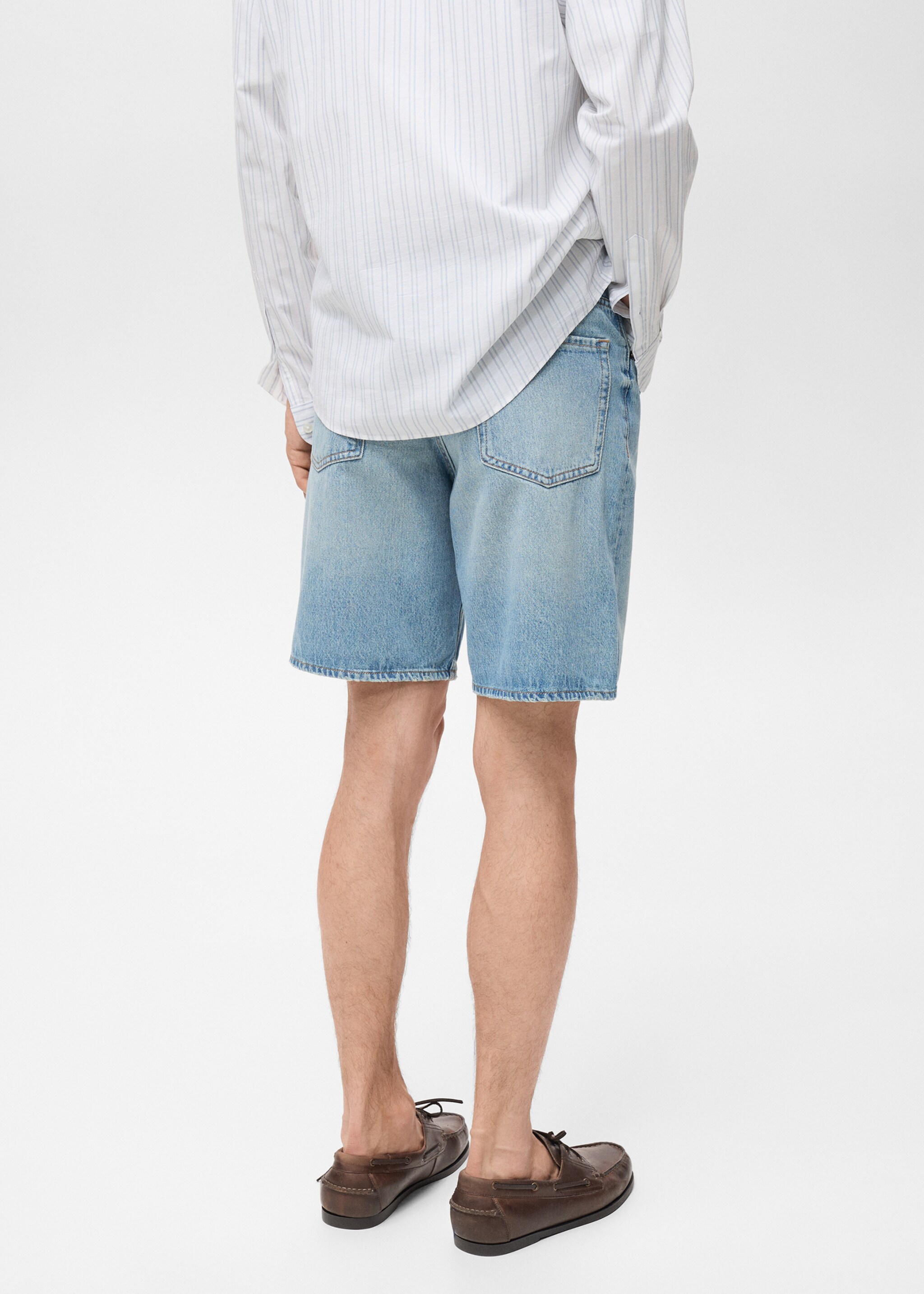 Denim bermuda shorts with washed effect - Reverse of the article