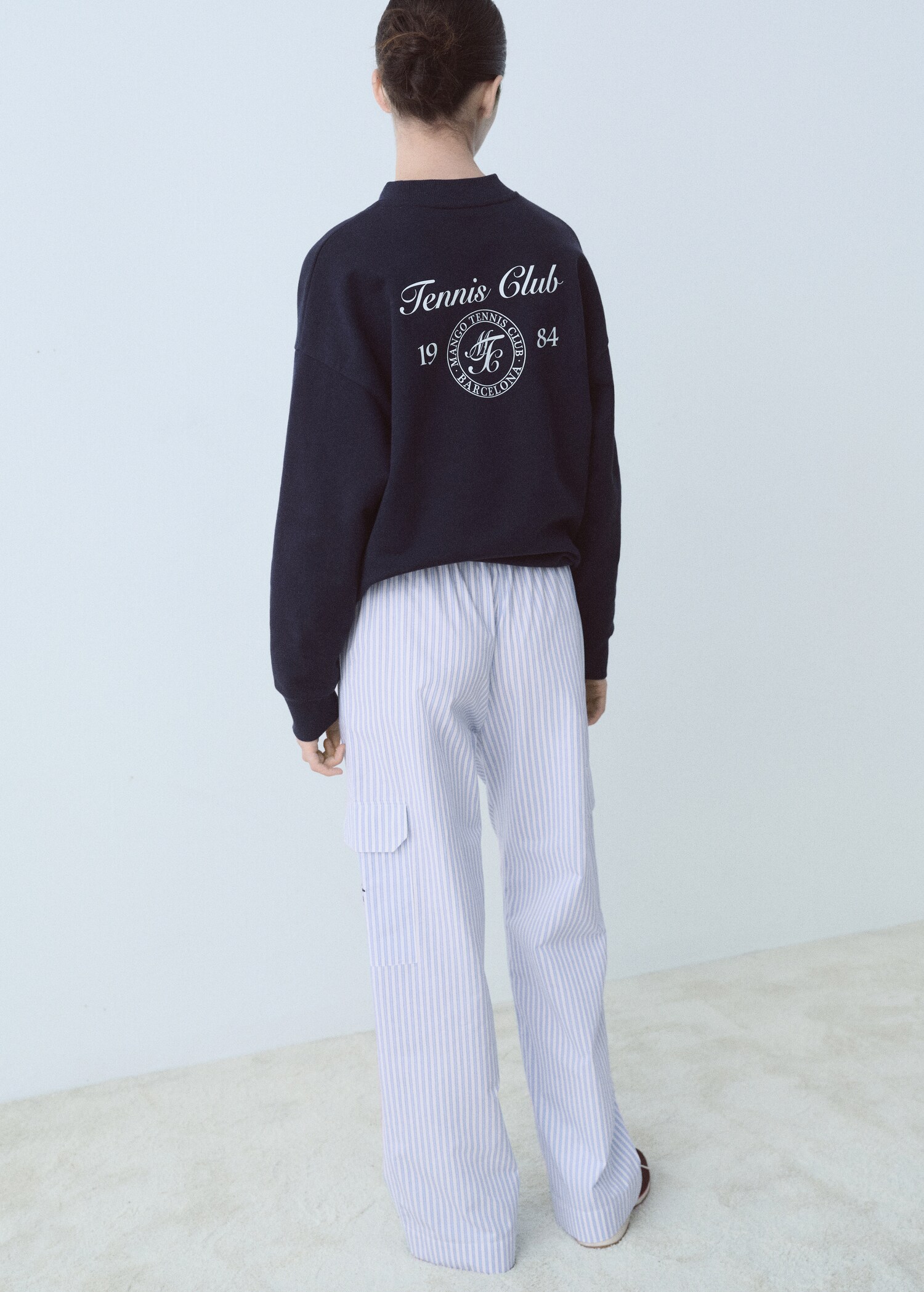 Striped poplin pants with pockets - Reverse of the article