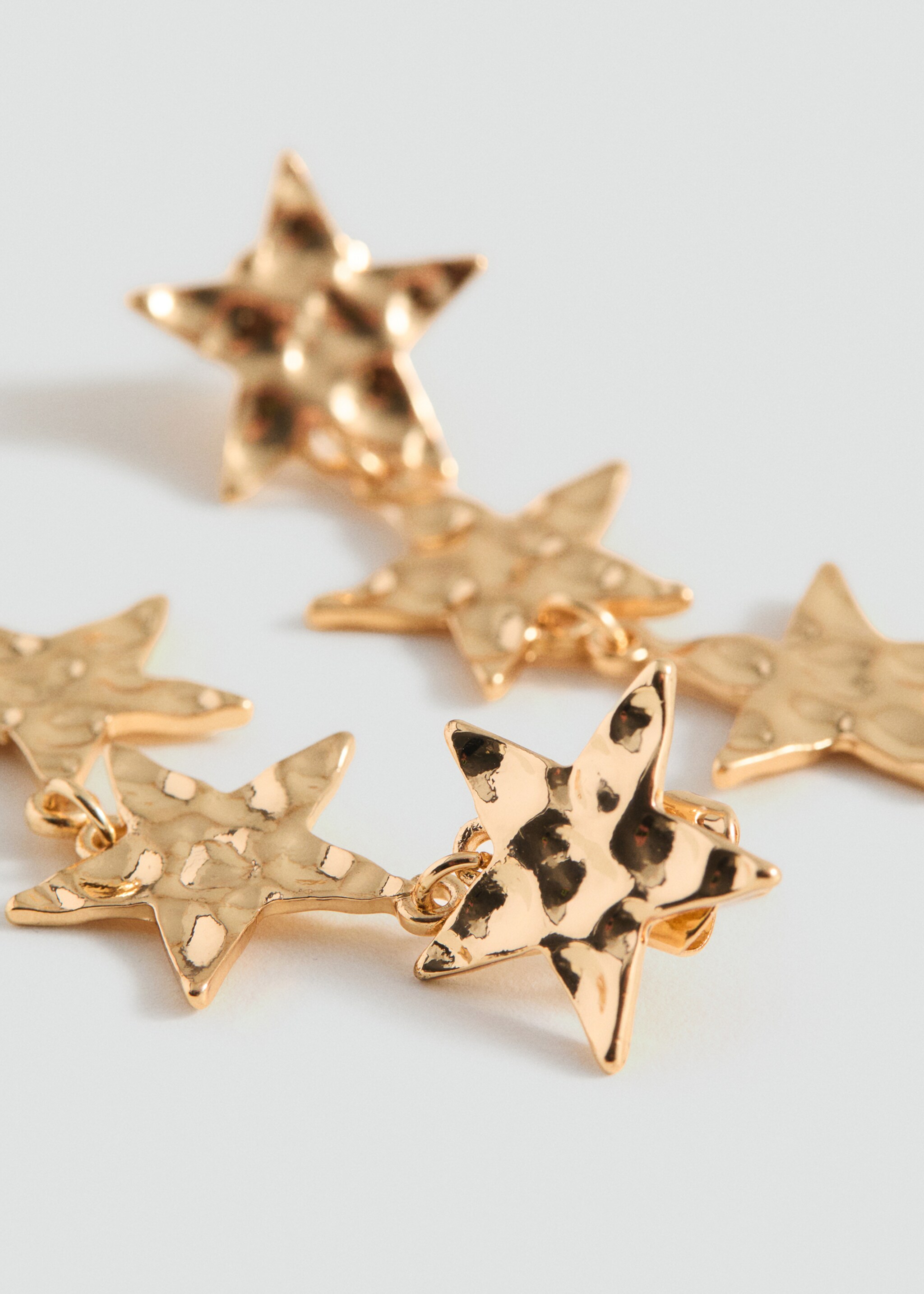 Pendientes largos estrellas - Plano medio