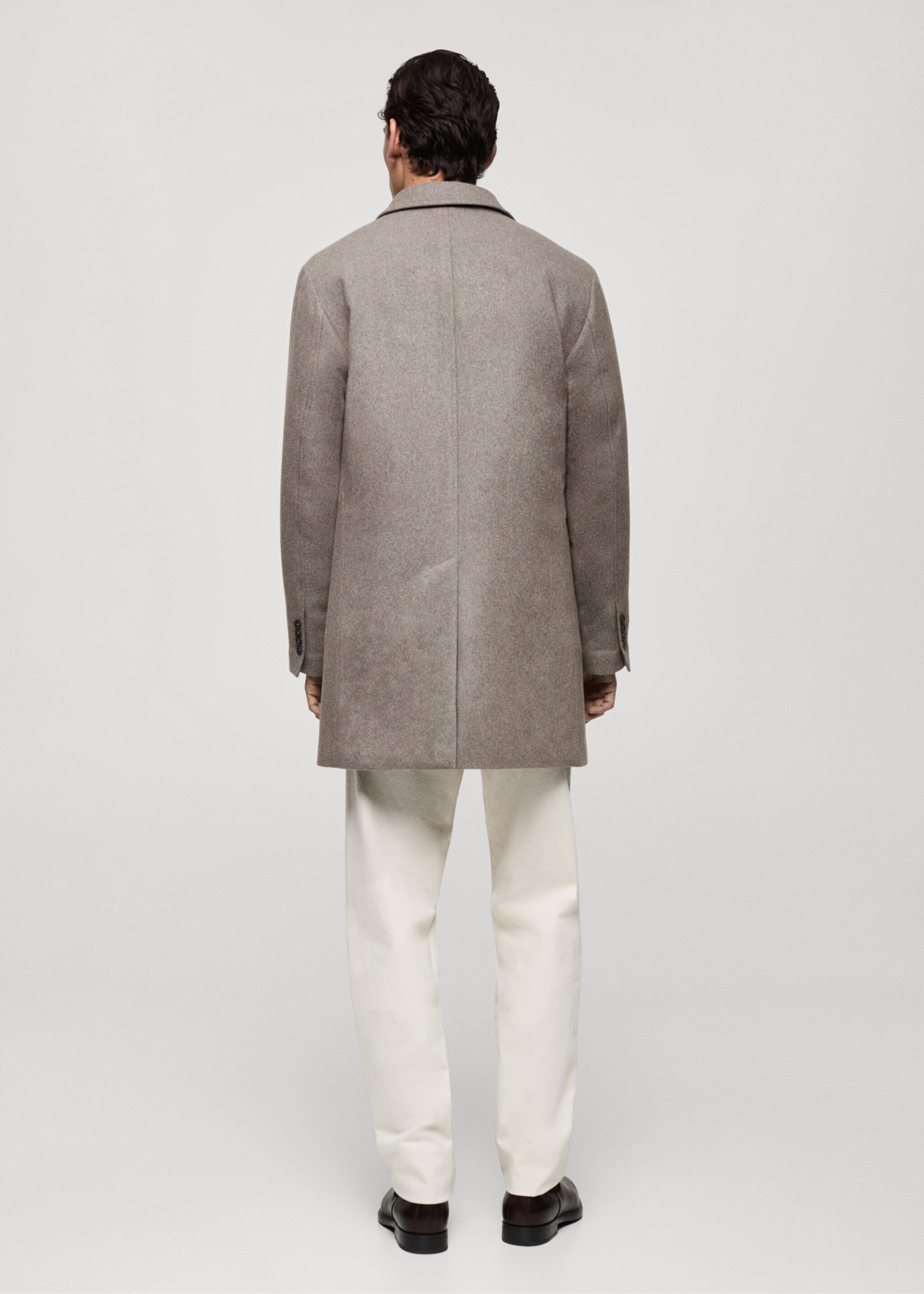 Quilted wool inner coat - Reverse of the article