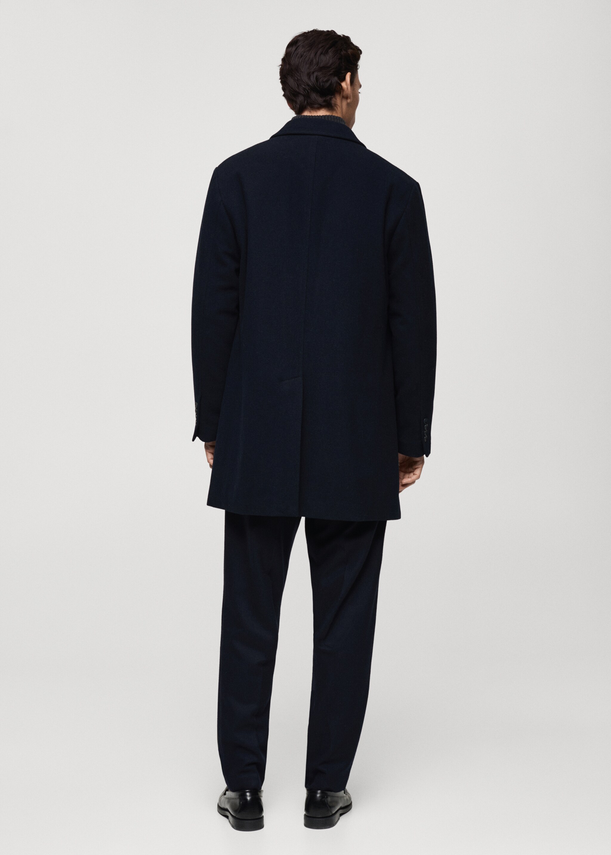 Quilted wool inner coat - Reverse of the article