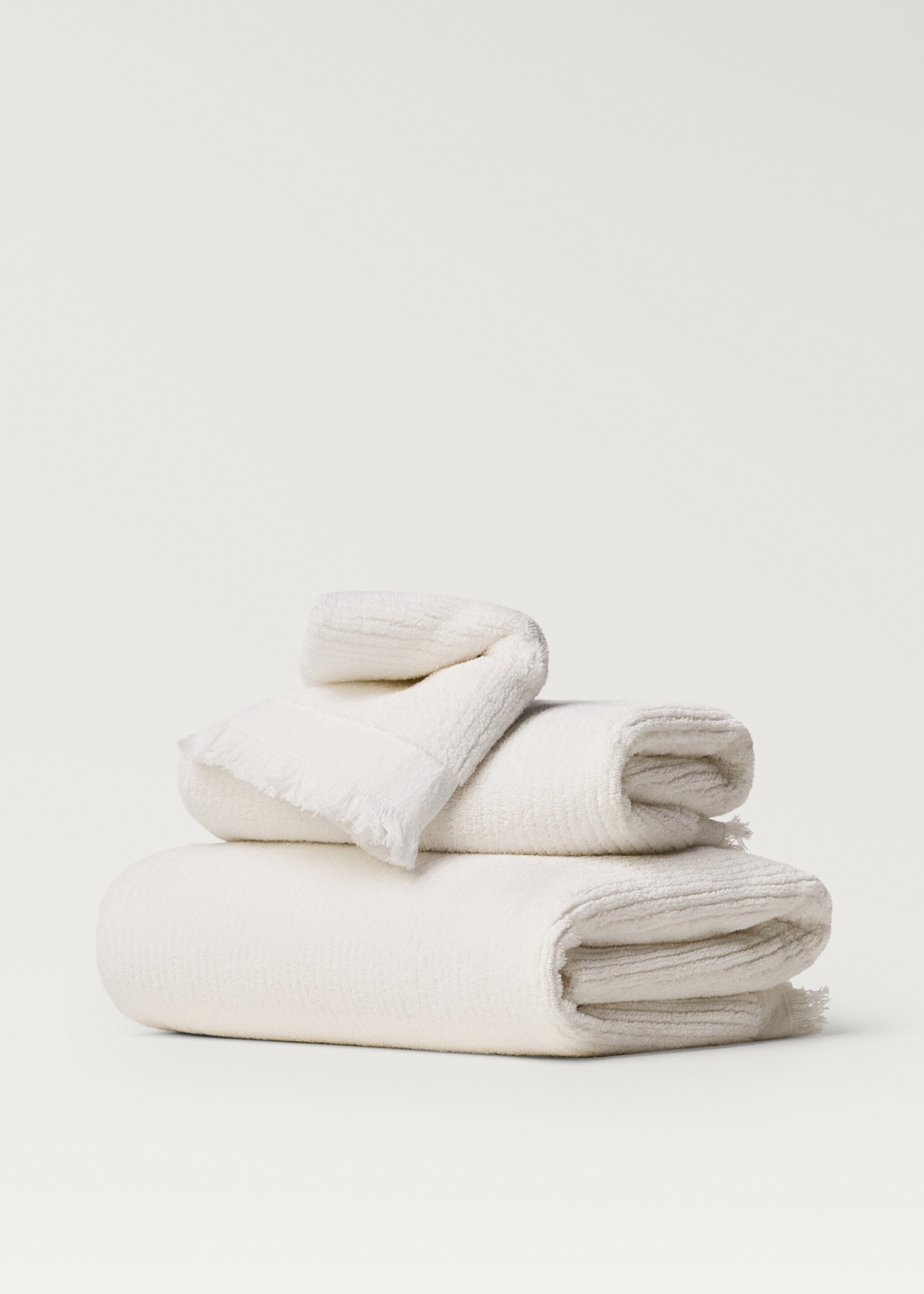 Stripe-embossed hand towel with fringes - Article without model