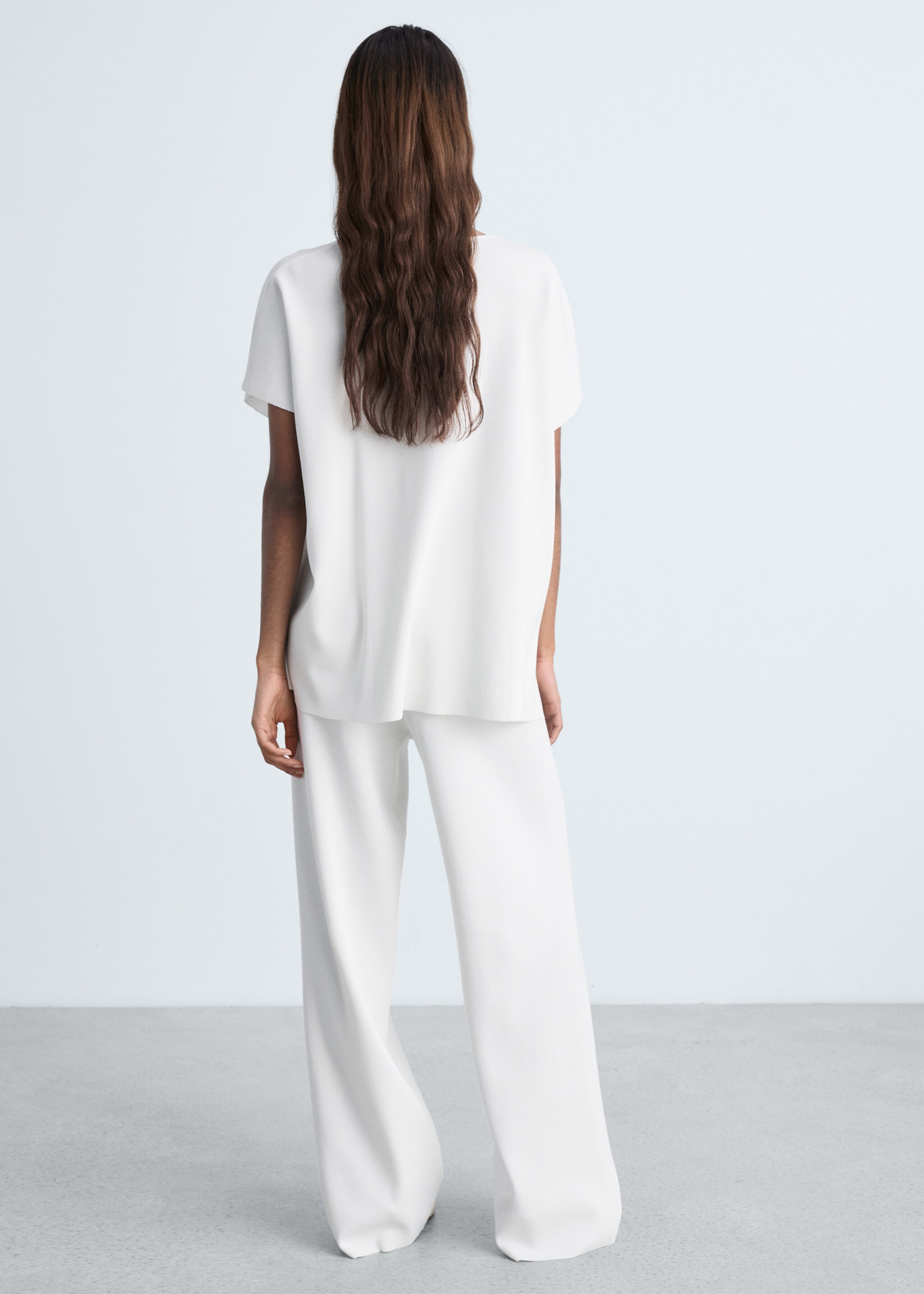 Straight knitted trousers - Reverse of the article