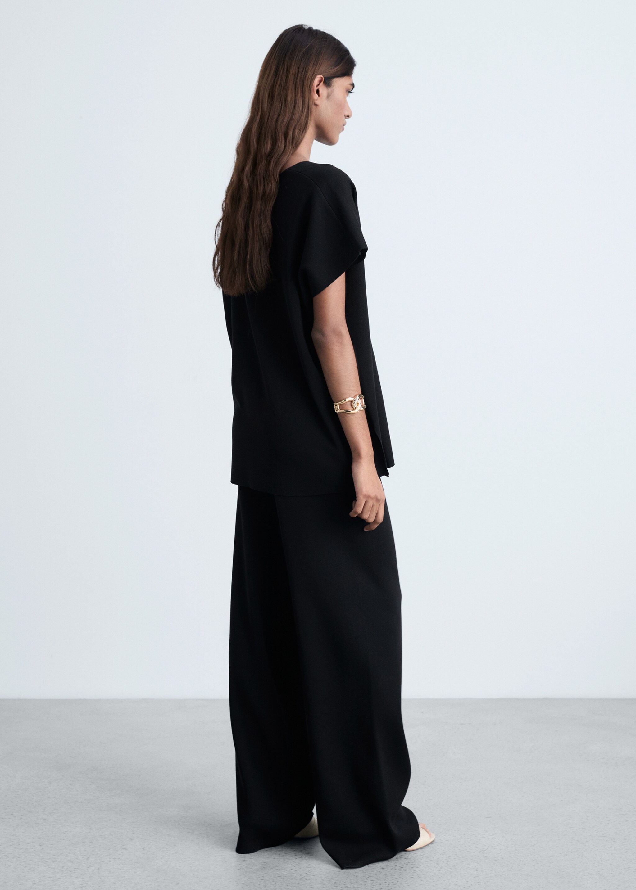 Straight knitted trousers - Reverse of the article