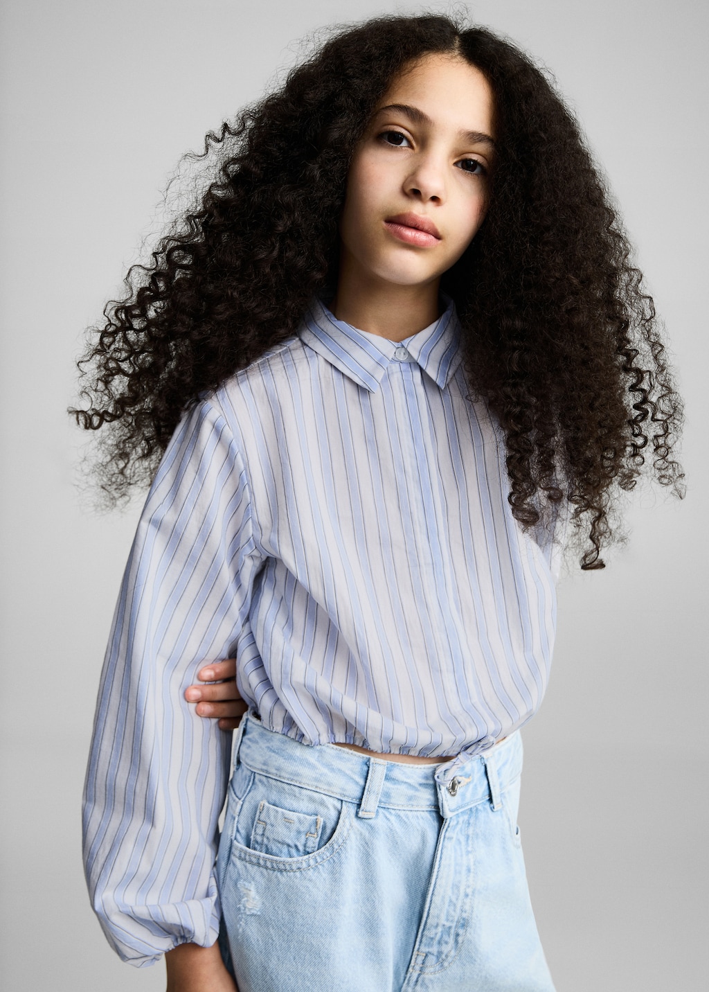 Shirt with adjustable waist