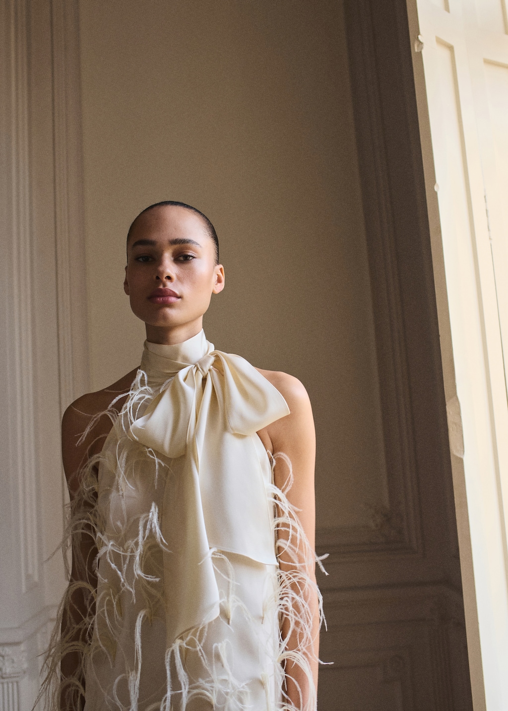 Halter dress with feather decoration