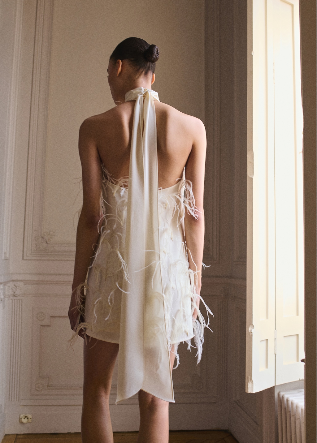 Halter dress with feather decoration