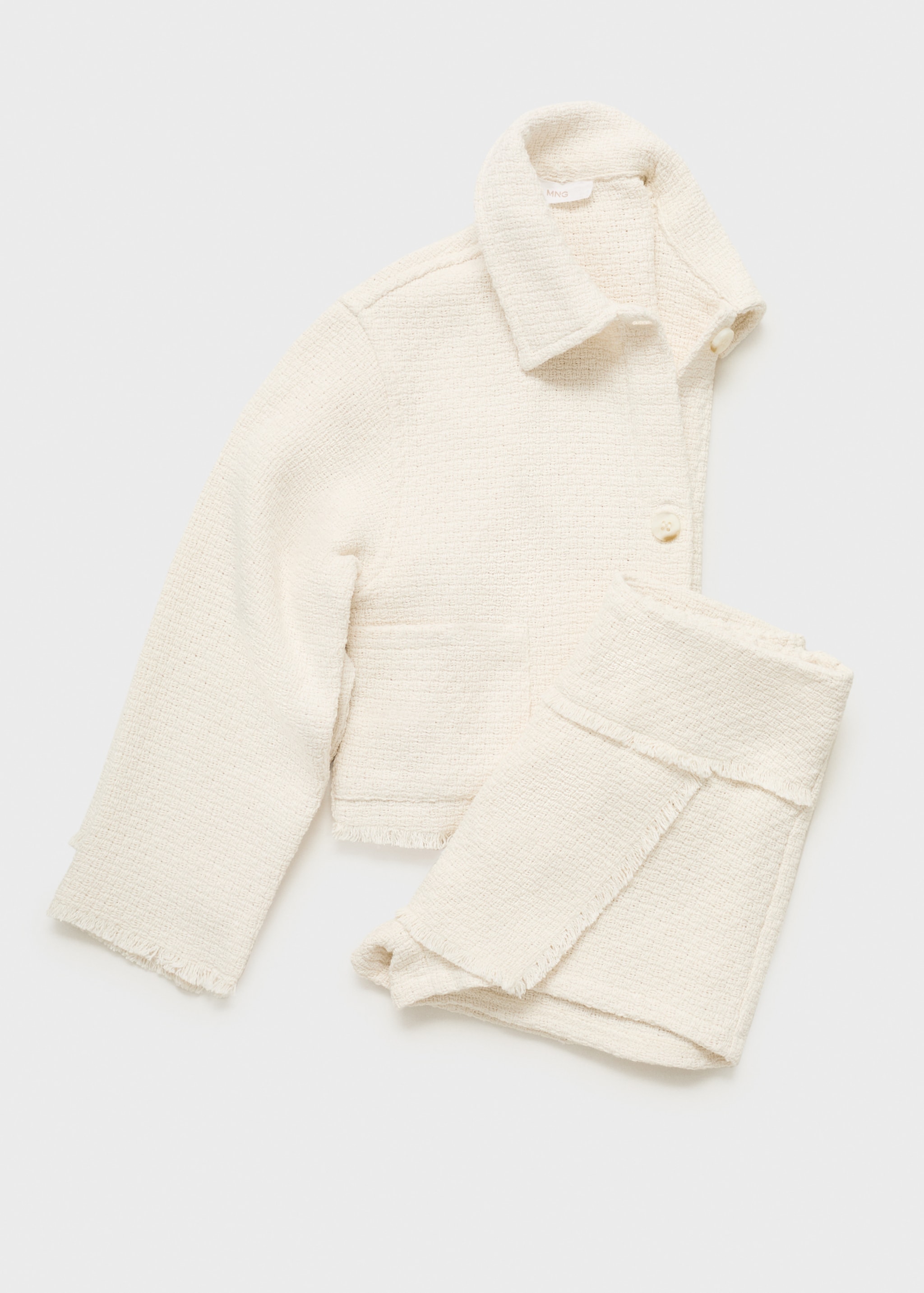 Jupe short effilochée - Détail de l'article 8