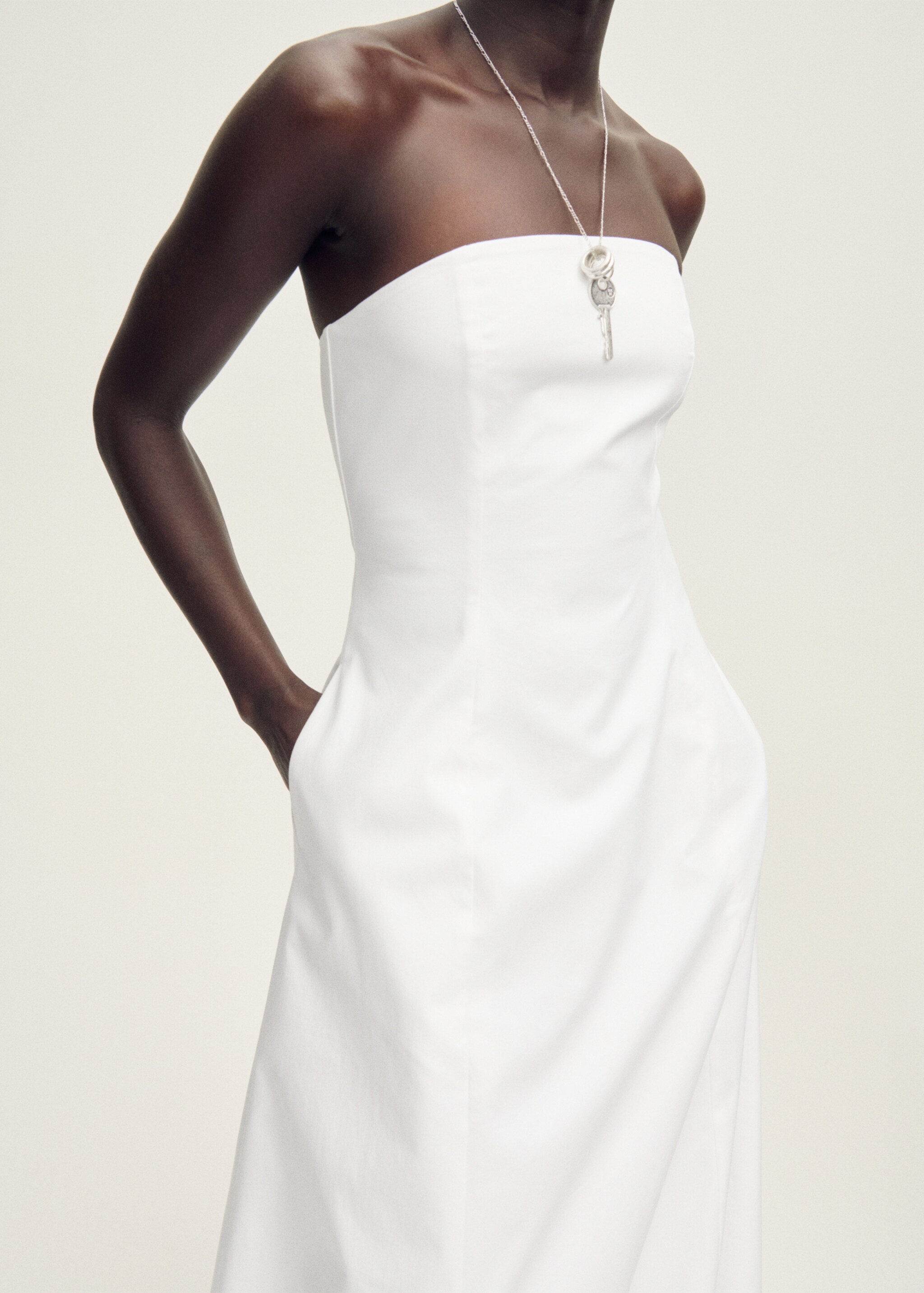 Strapless dress with puffed hem - Details of the article 6