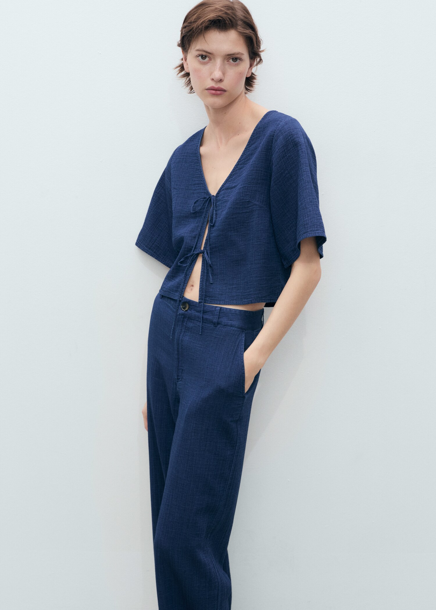 High-waisted denim flowy trousers - Details of the article 1
